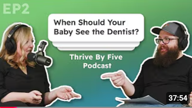 A podcast cover image featuring a woman and a man in a conversation. The woman is wearing headphones and speaking into a microphone. The man, with a beard and glasses, is pointing at her. The background is green with text that says, 'When Should Your Baby See the Dentist?'. Additional text reads, 'Thrive By Five Podcast' and 'EP2'. Duration of the episode is 37:54.