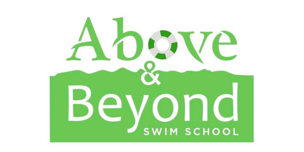 Logo for Above & Beyond Swim School with green and white text and a soccer ball incorporated into the letter 'O' in 'Above'.