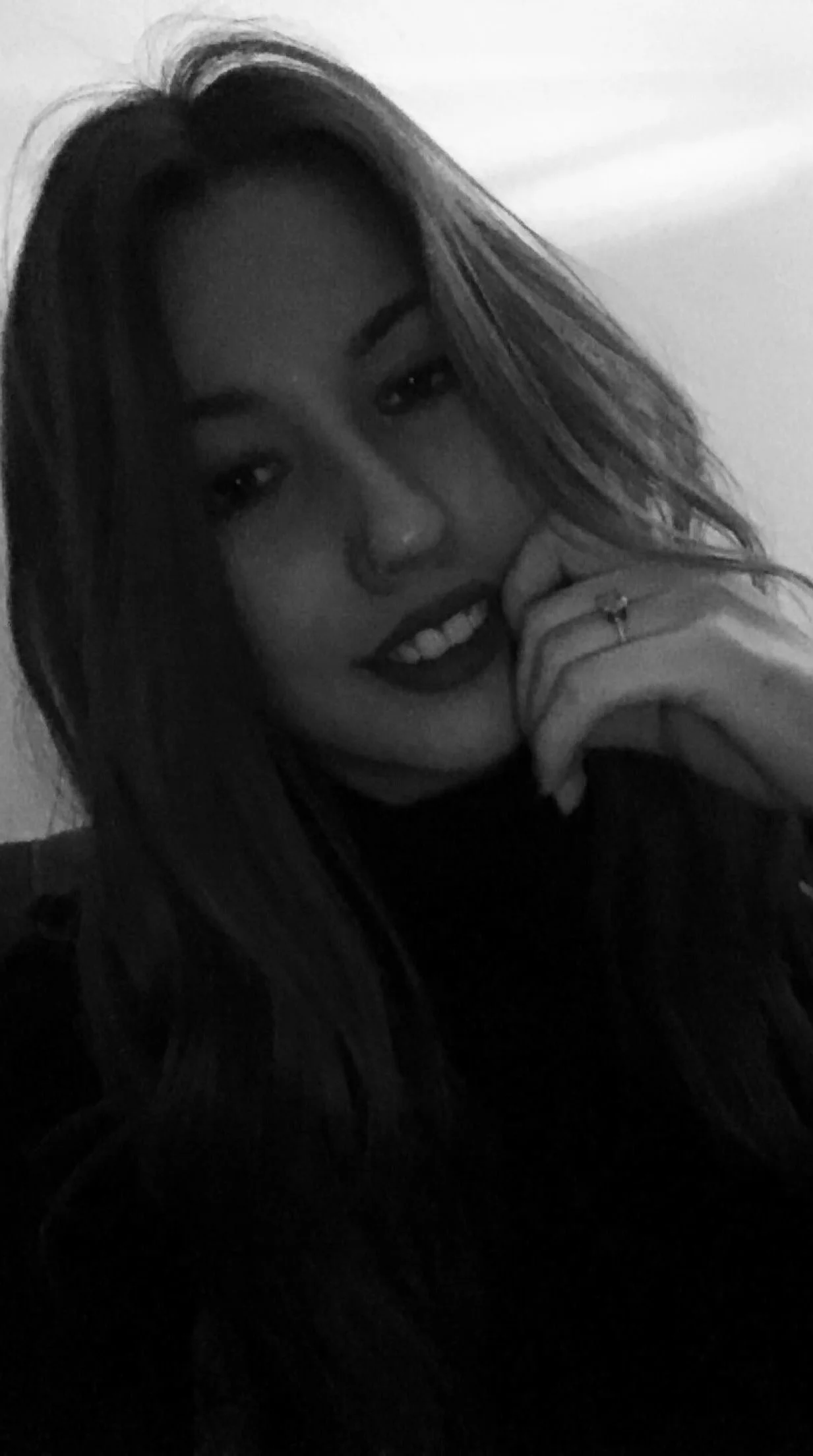 PR Team Member Alina in black and white slanted selfie.