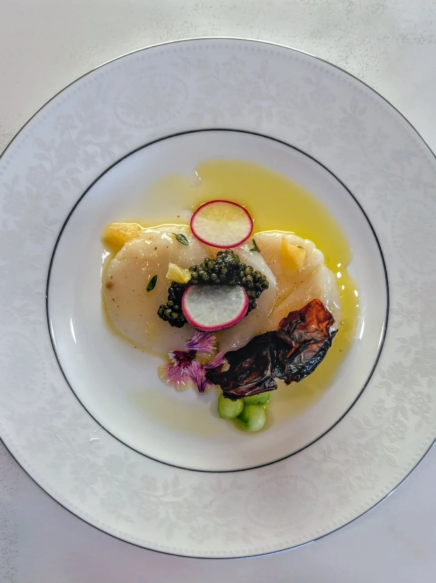 Scallop carpaccio Meyer lemon pickled radish candied cucumber tomato skin chip Ossetia caviar and served to a very famous politician who loved it ;)