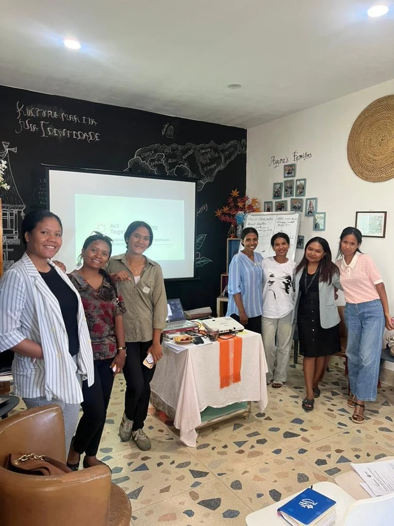 Seven women in Timor-Leste attending a training session
