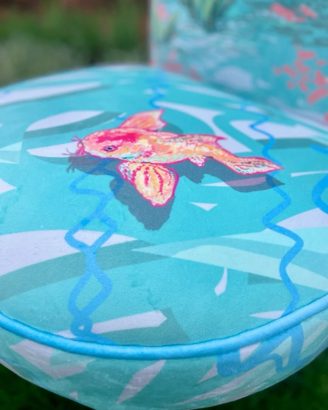 &lsquo; The pond&rsquo; is completed! On the back is an abstract interpretation of water and the seat is as if you are looking down into the reflections of the water. The clouds are framing the top of the tub chair