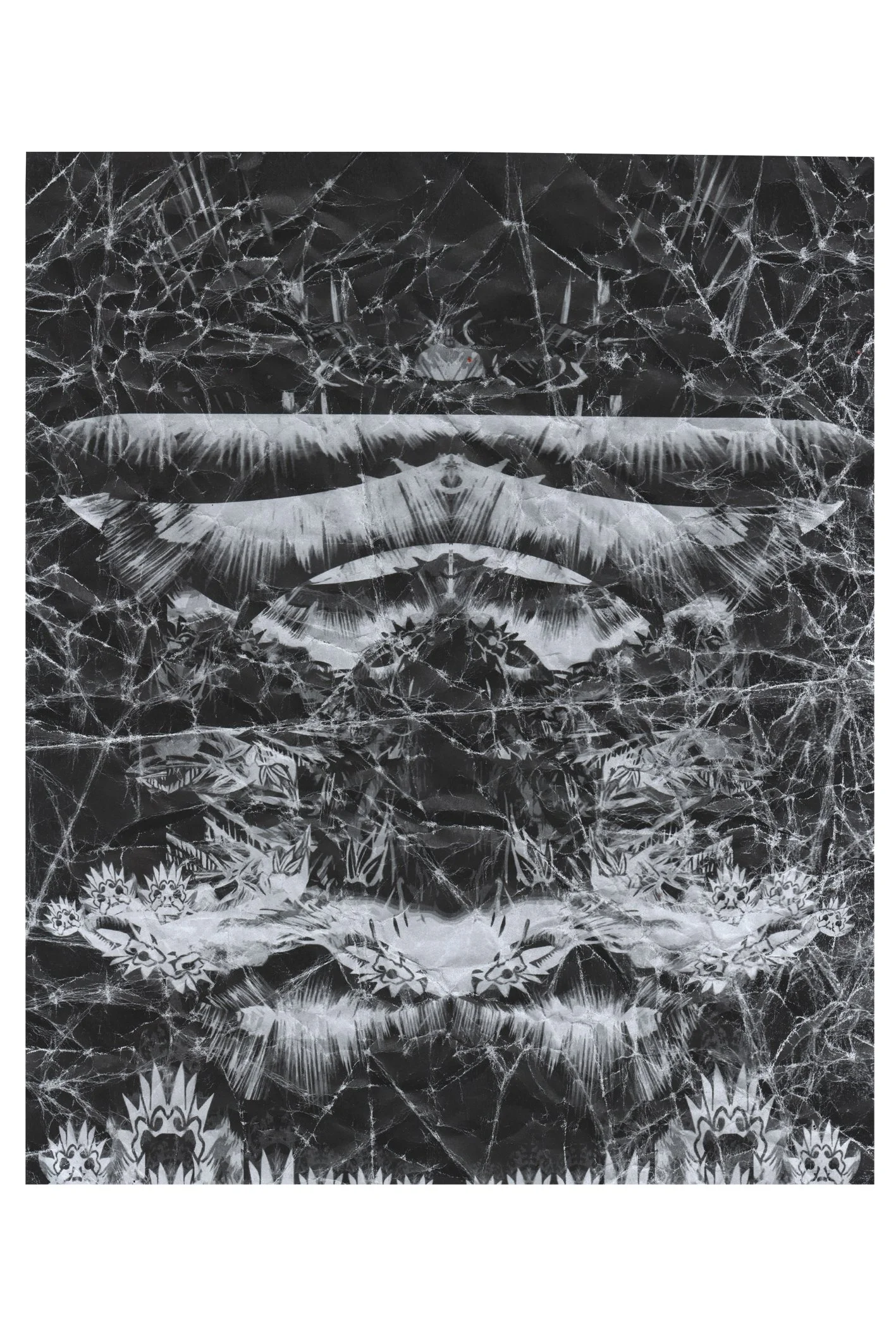 Abstract black and white patterned design featuring symmetrical motifs, sharp lines, and intricate details.