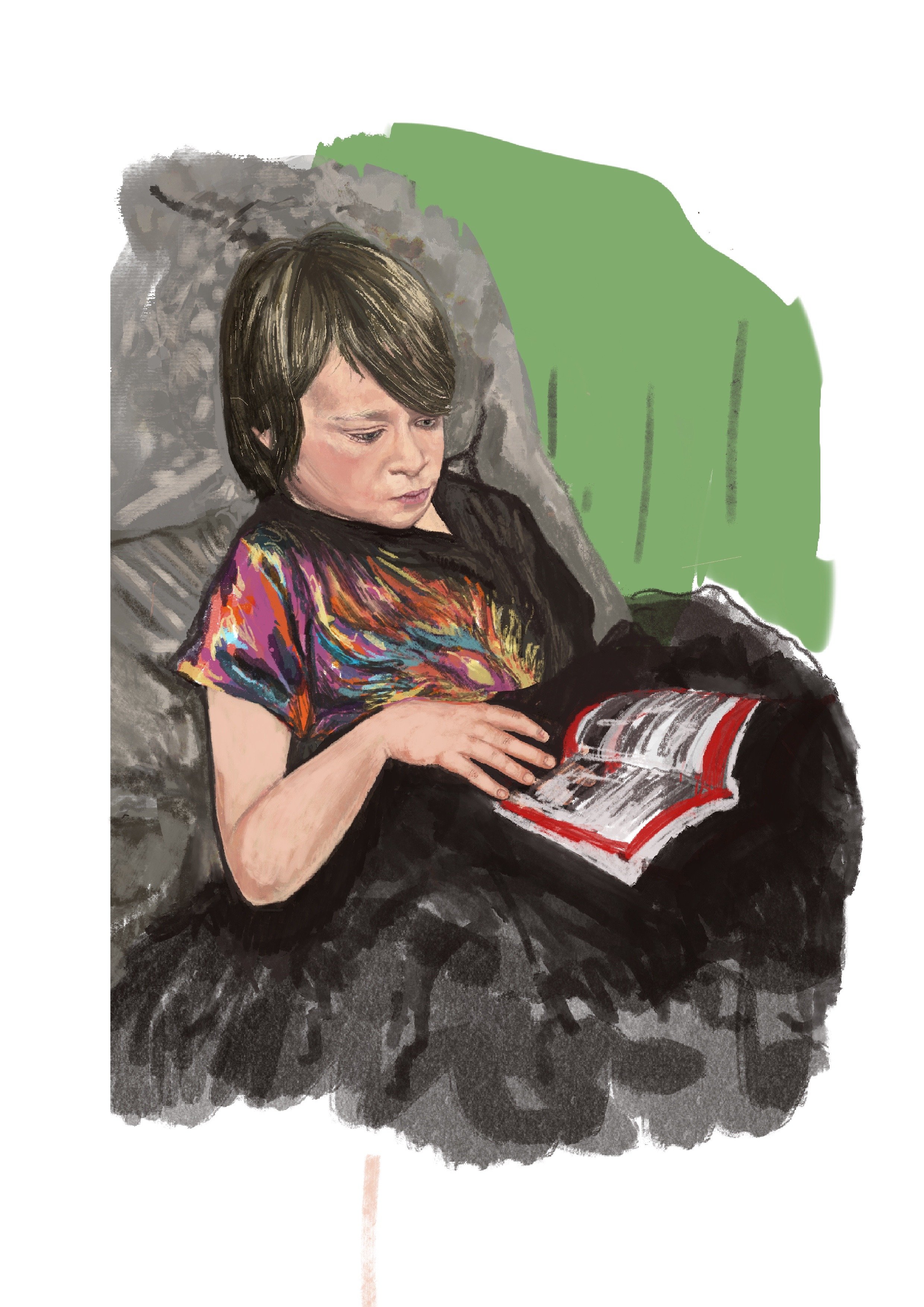 A young boy with brown hair sitting on a gray couch, reading a magazine.