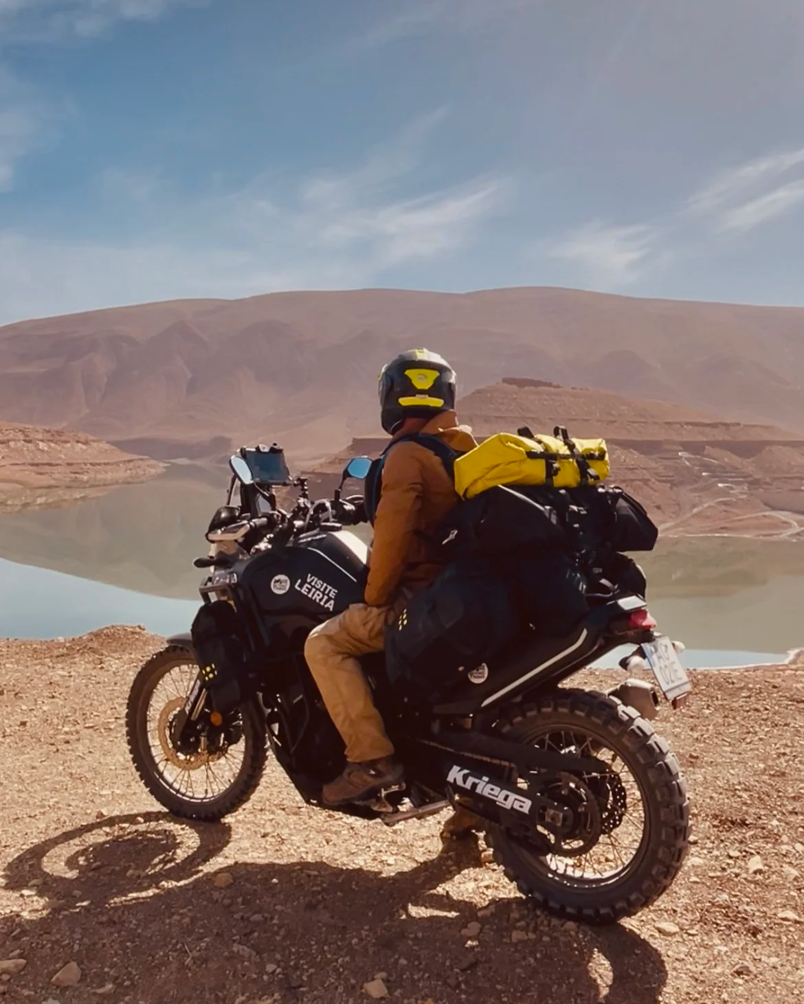 João Beltrão founder of Beyond T7nnis with is Yamaha Ténéré 700 motorcycle full of tennis gear in his kriega luggage in the High Atlas in Morocco