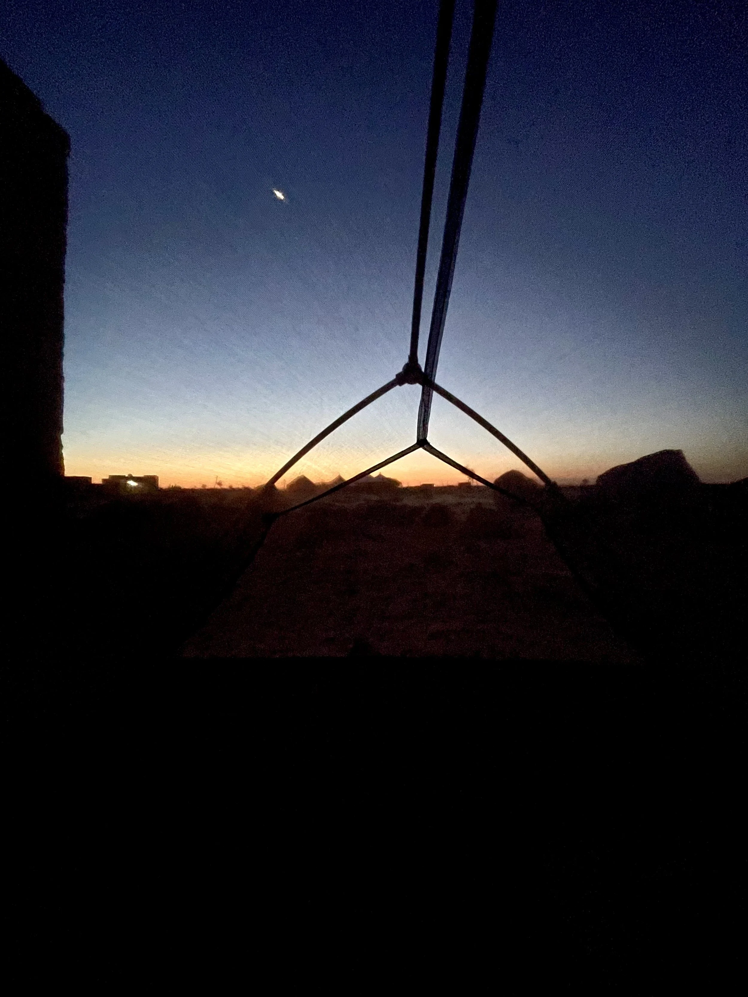 João Beltrão founder of Beyond T7nnis camping in Mauritania with sunrise
