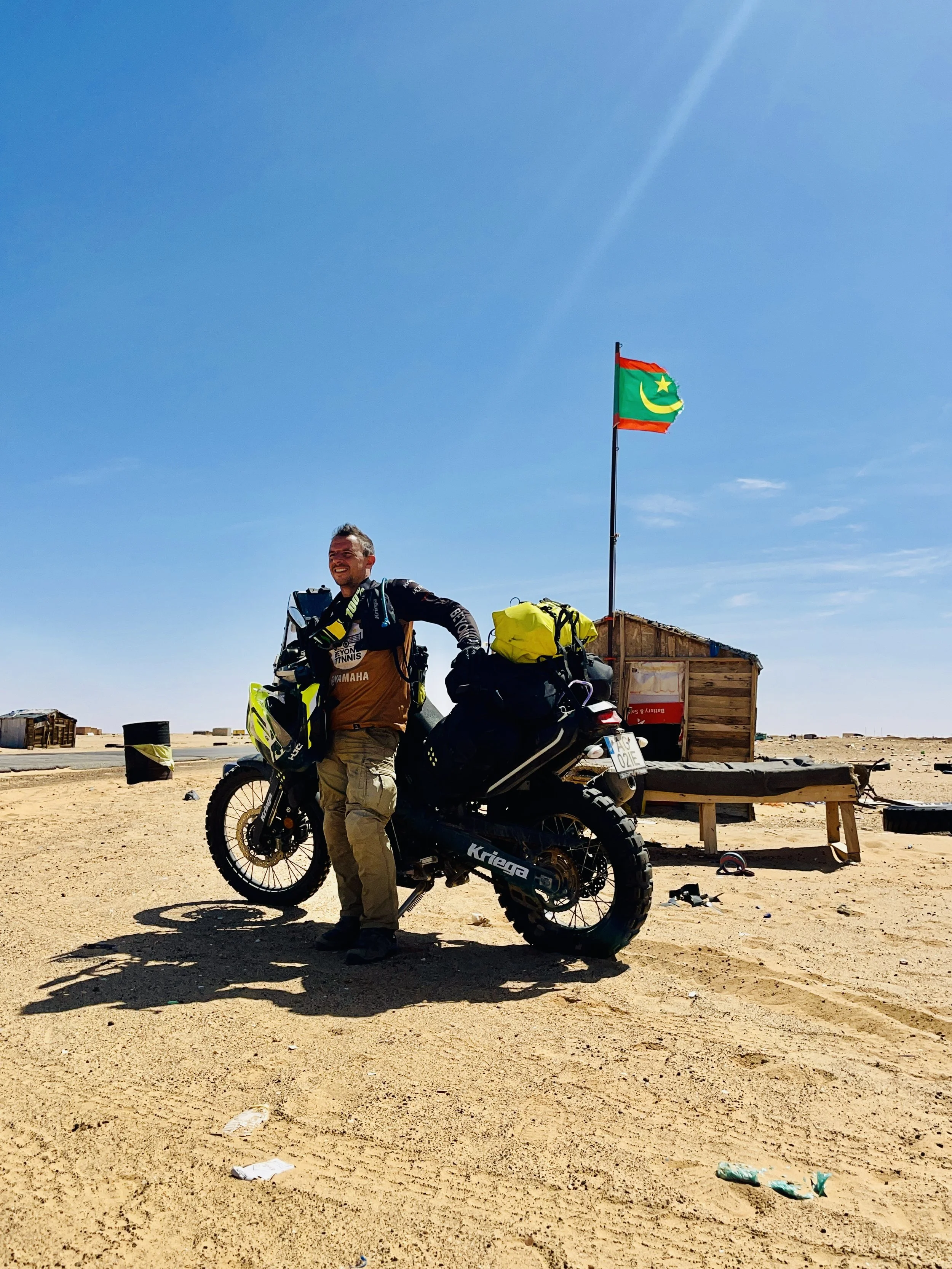 João Beltrão founder of Beyond T7nnis with his Yamaha Ténére 700 motorcycle in Mauritania
