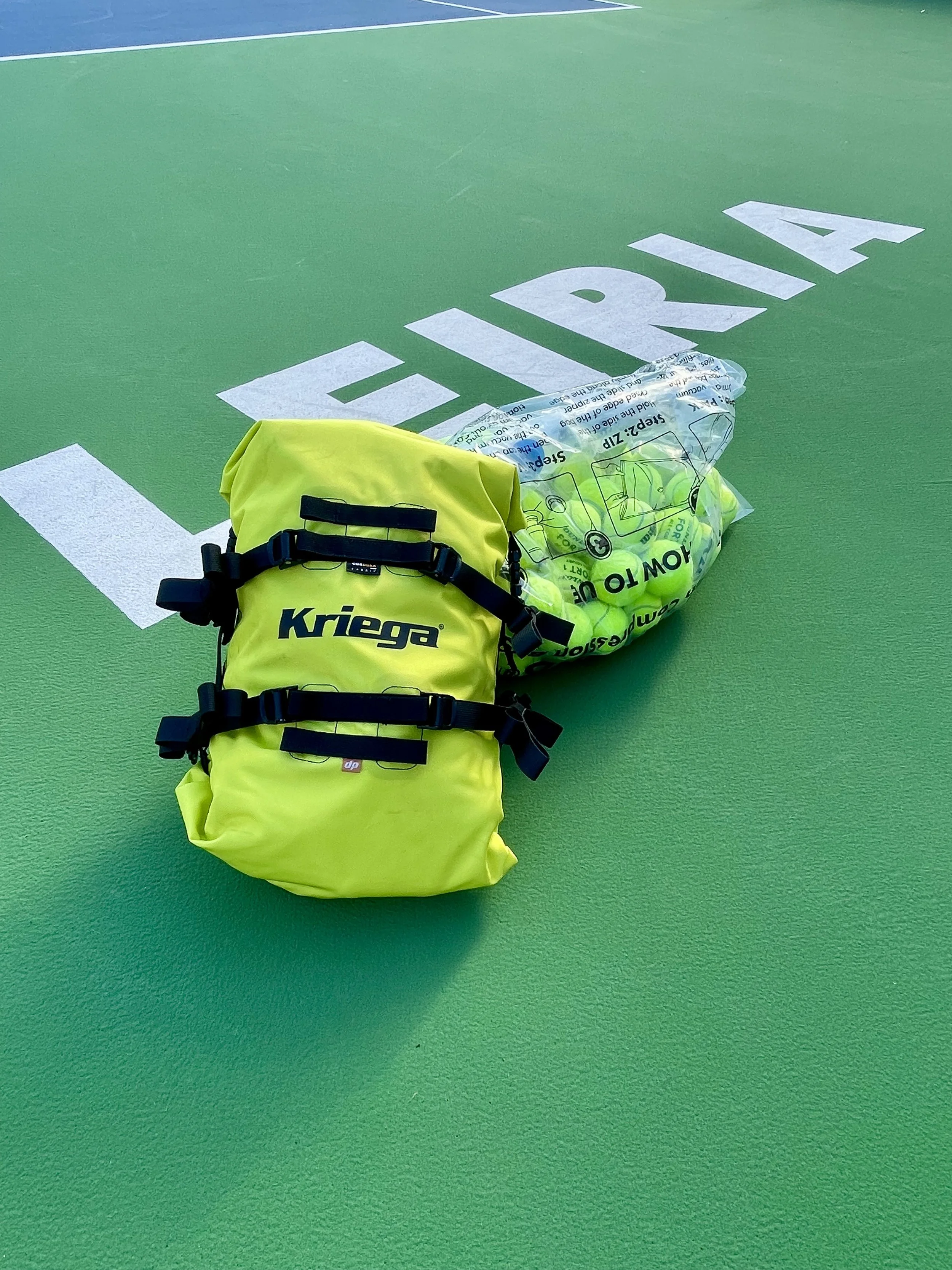 Kriega rollpack 20 with  tennis balls at CETL tennis club in Leiria