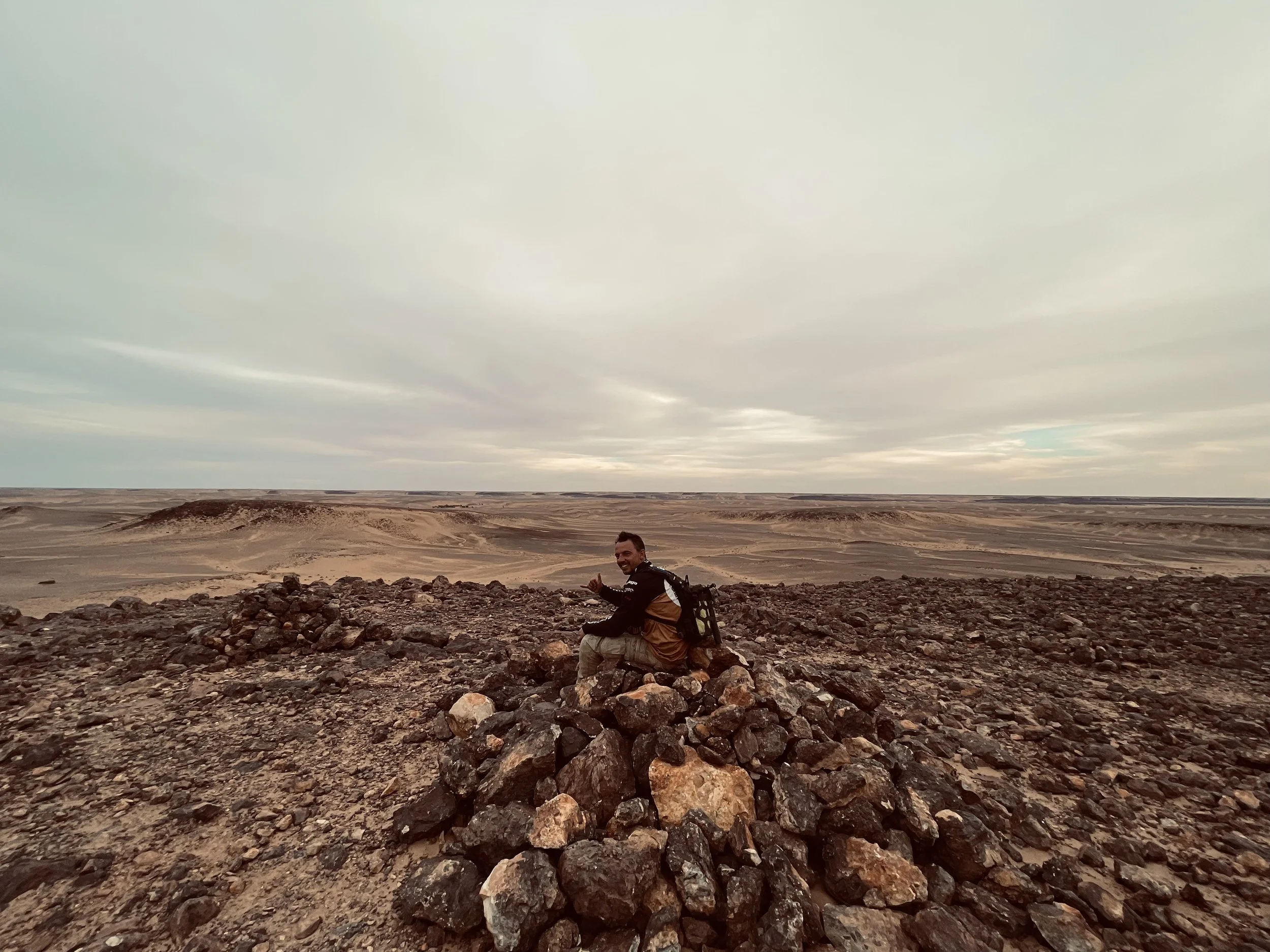 João Beltrão founder of Beyond T7nnis in the center of Guelb er Richat, Richat Structure, Eye of the Sahara, in Mauritania
