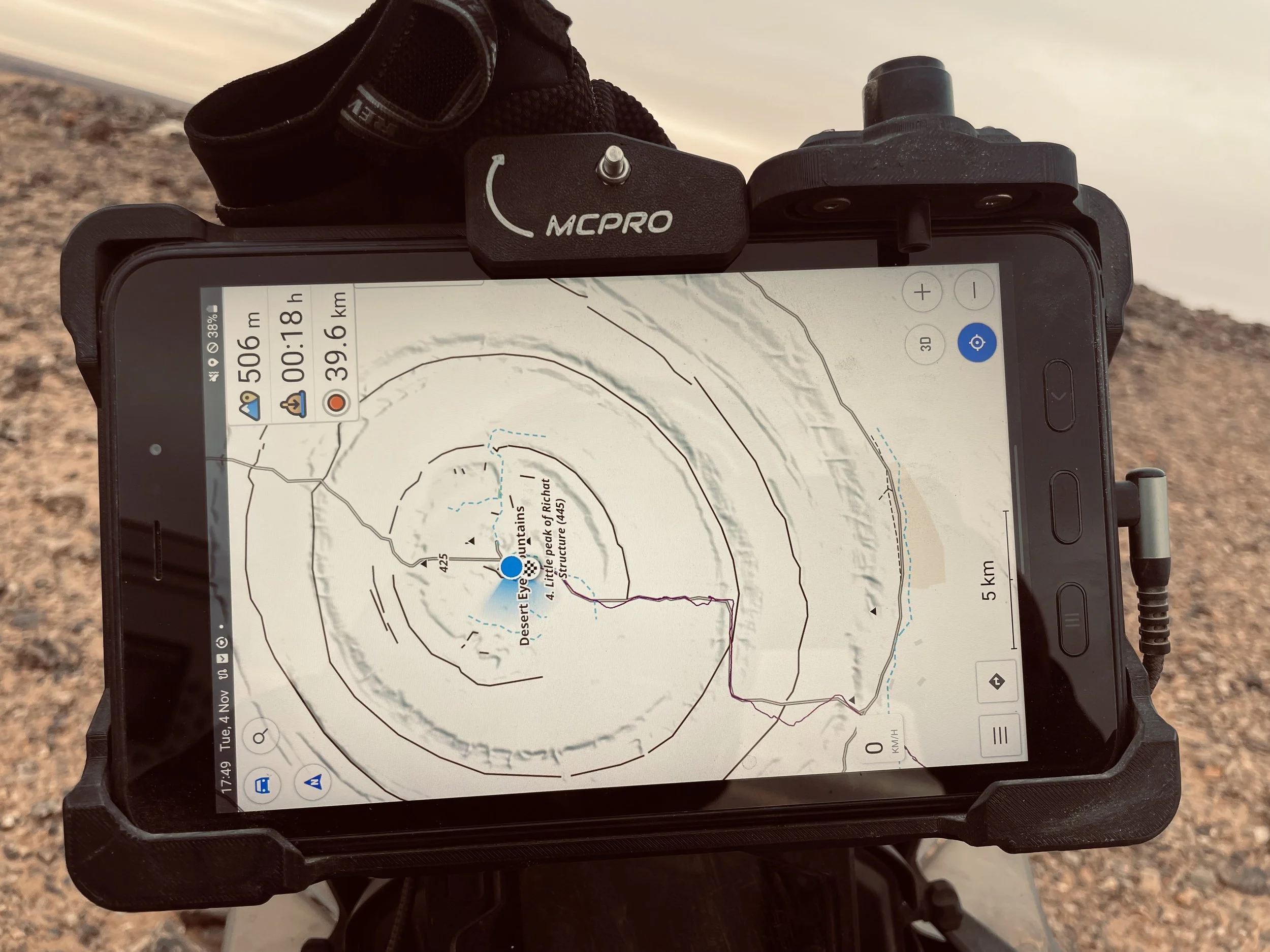 João Beltrão founder of Beyond T7nnis with his Yamaha Ténéré 700 in the center of Guelb er Richat, Richat Structure, Eye of the Sahara, in Mauritania. 