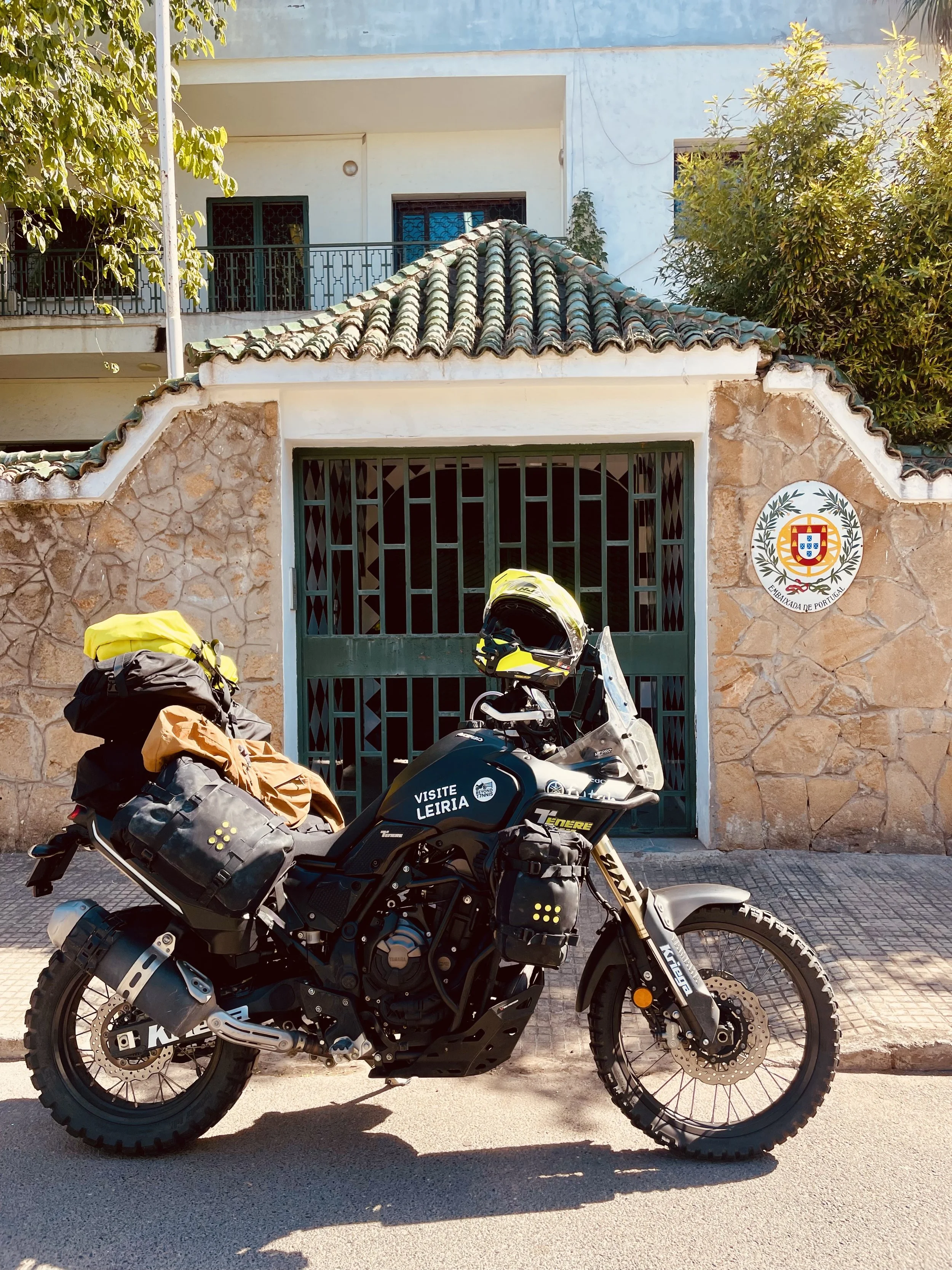 Yamaha Ténére 700 motorcycle with kriega luggage in front of the portuguese embassy in Rabat, Morocco