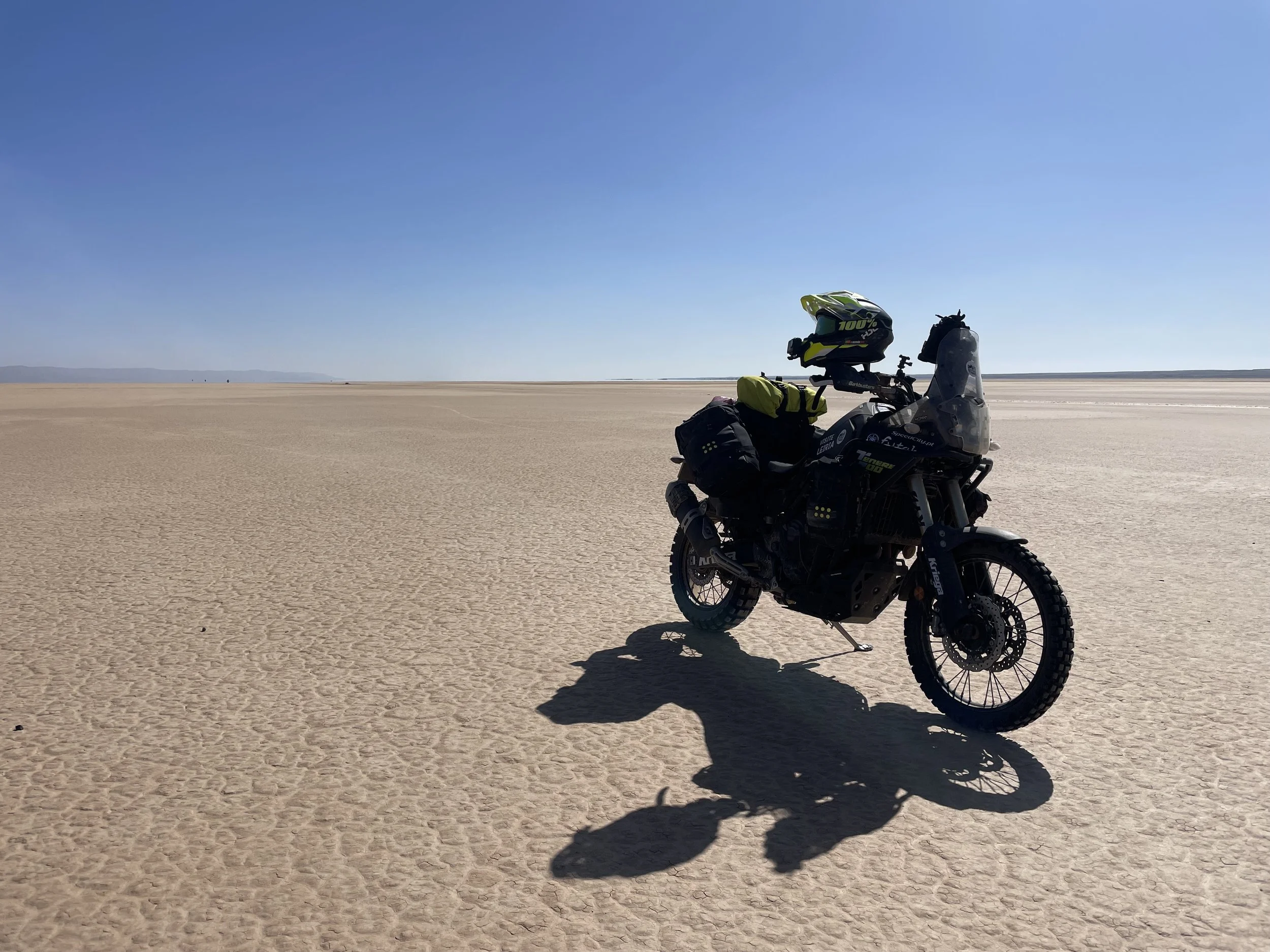 Yamaha Ténére 700 motorcycle crossing the yellow lake in sahara desert