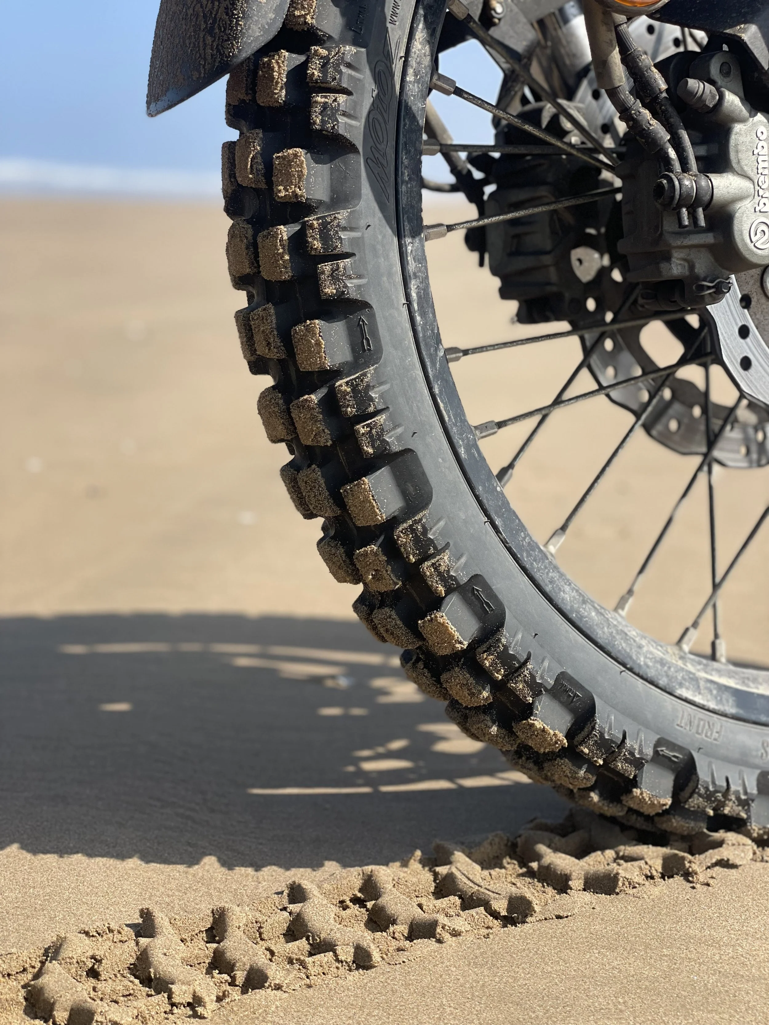 Yamaha Ténére 700 motorcycle with Motoz Tractionator Rallz tires in Plage Blanche, Morocco during a Beyond T7nnis mission