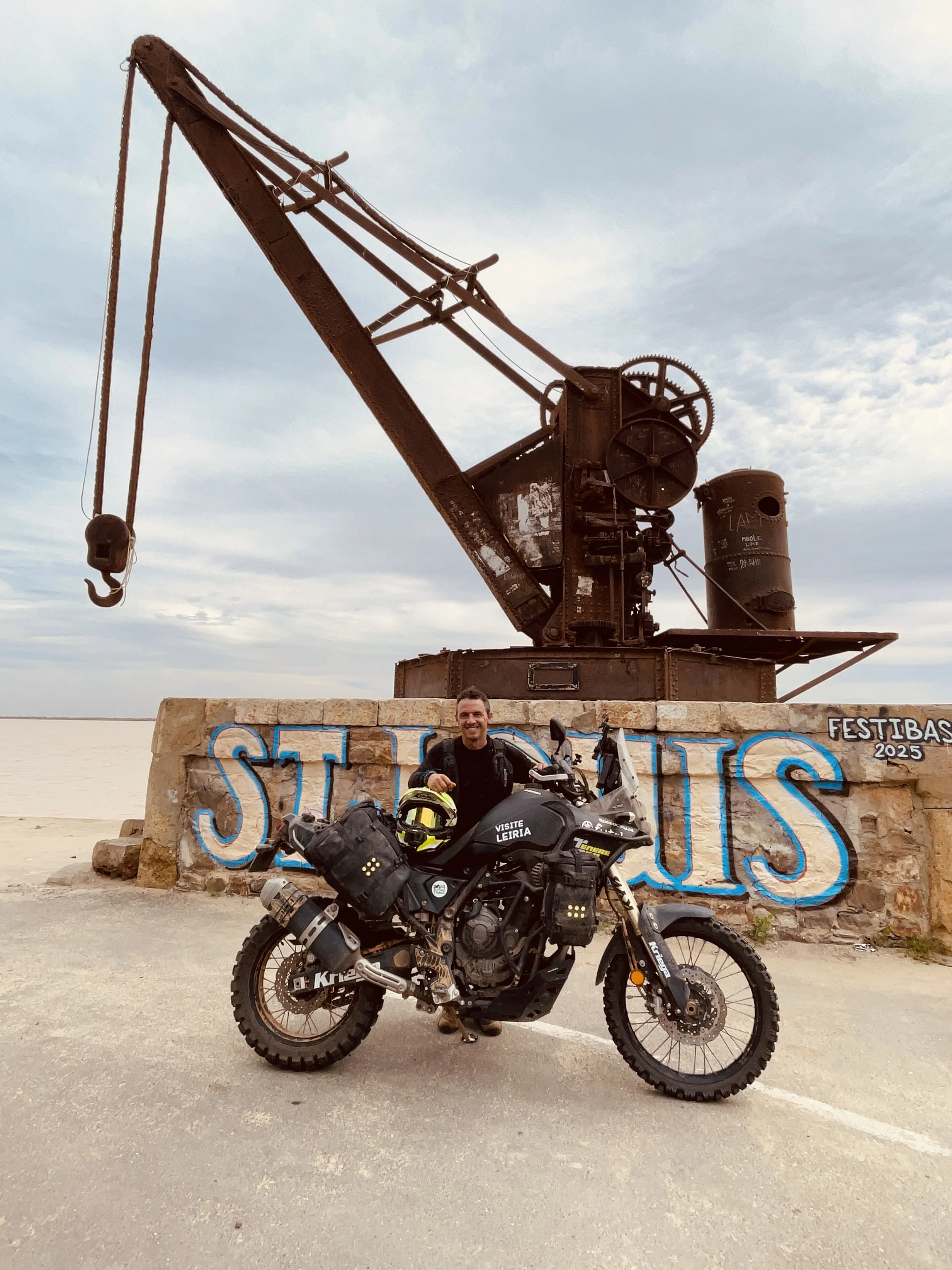 João Beltrão founder of Beyond T7nnis with his Yamaha Ténére 700 motorcycle in St. Louis, Senegal
