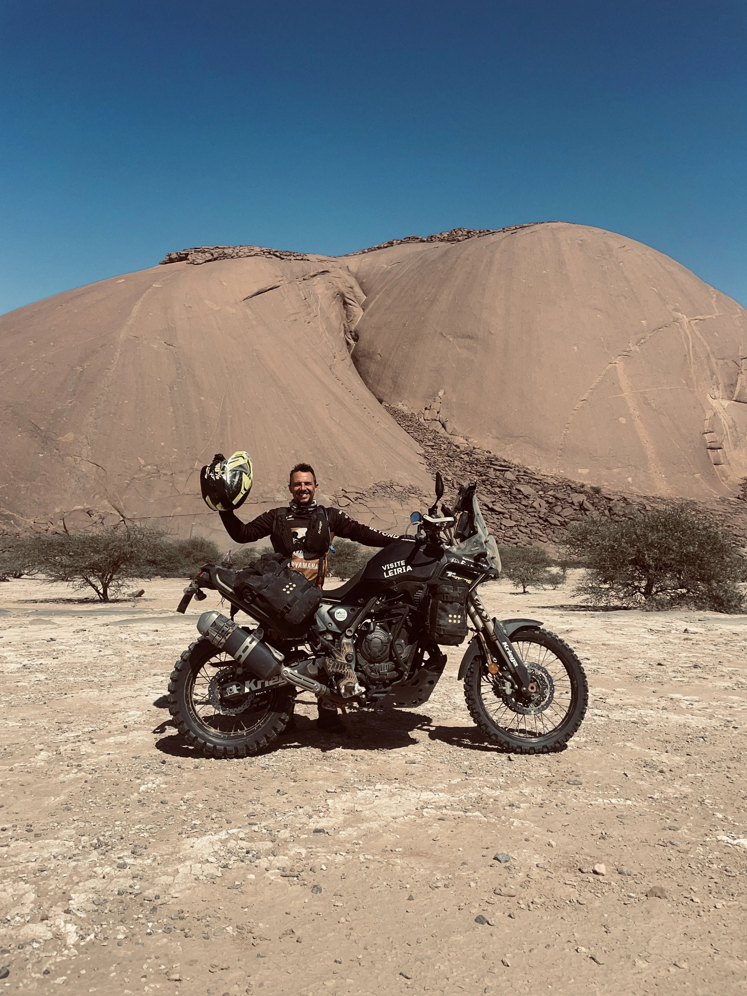 João Beltrão founder of Beyond T7nnis with his Yamaha Ténére 700 motorcycle in Ben Amera, Mauritania
