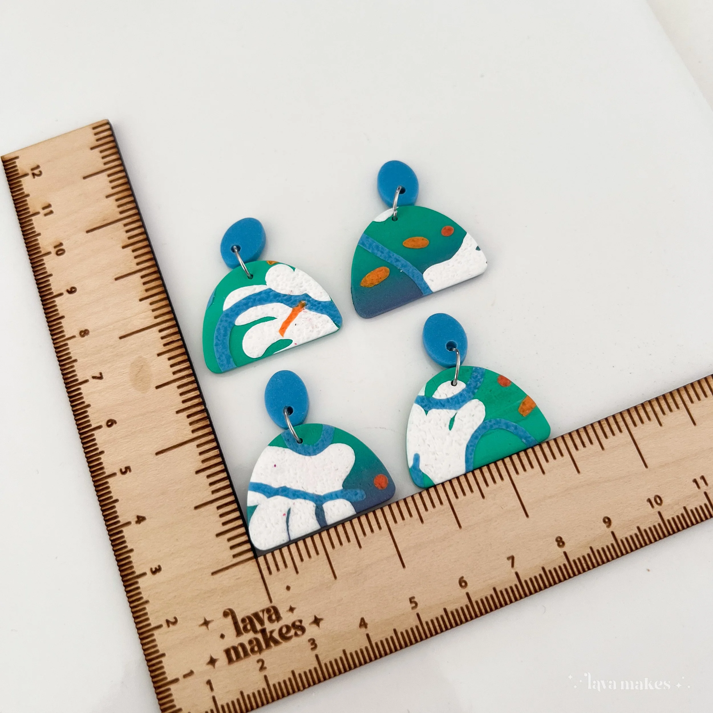 Semi Circle and Oval Abstract Print Lagoon Dangles in White and Deep Sky Blue