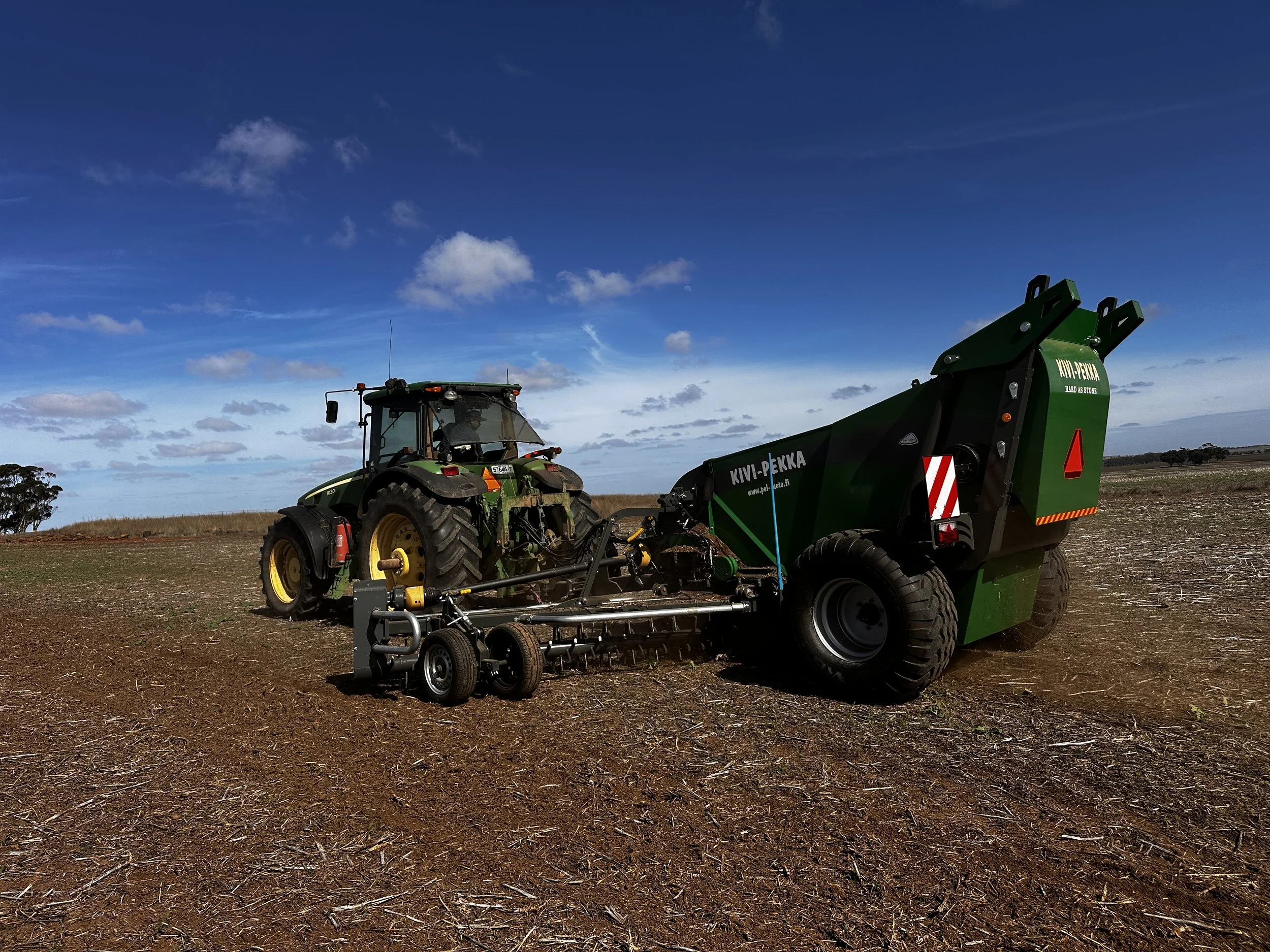 Kivi-Pekka 6 surface clearing stones in canola stubble with hydraulic drive kit.
