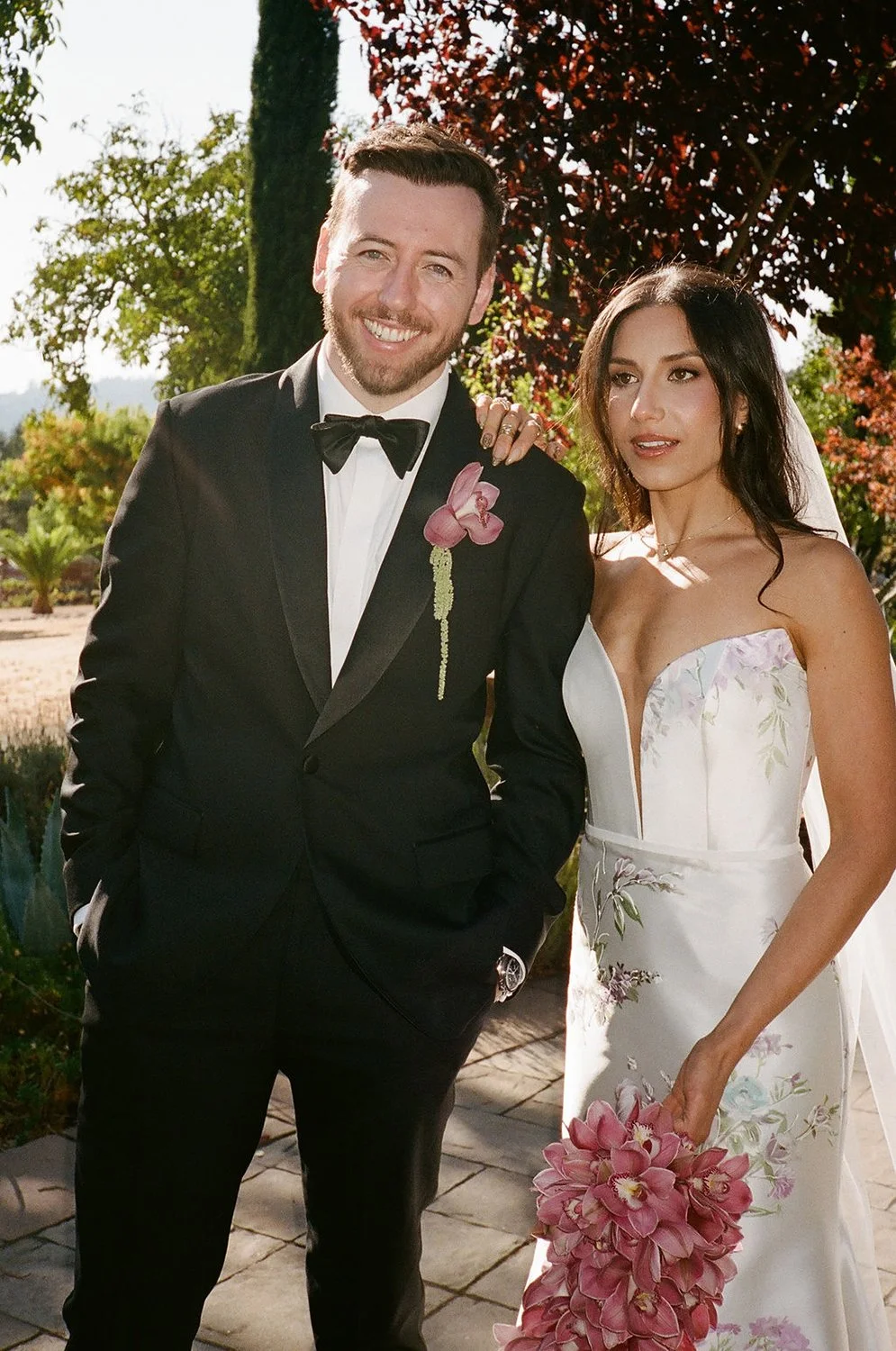 party-bride-groom-bouquet-cymbidiums-cinematic-film-photo-florist-wedding