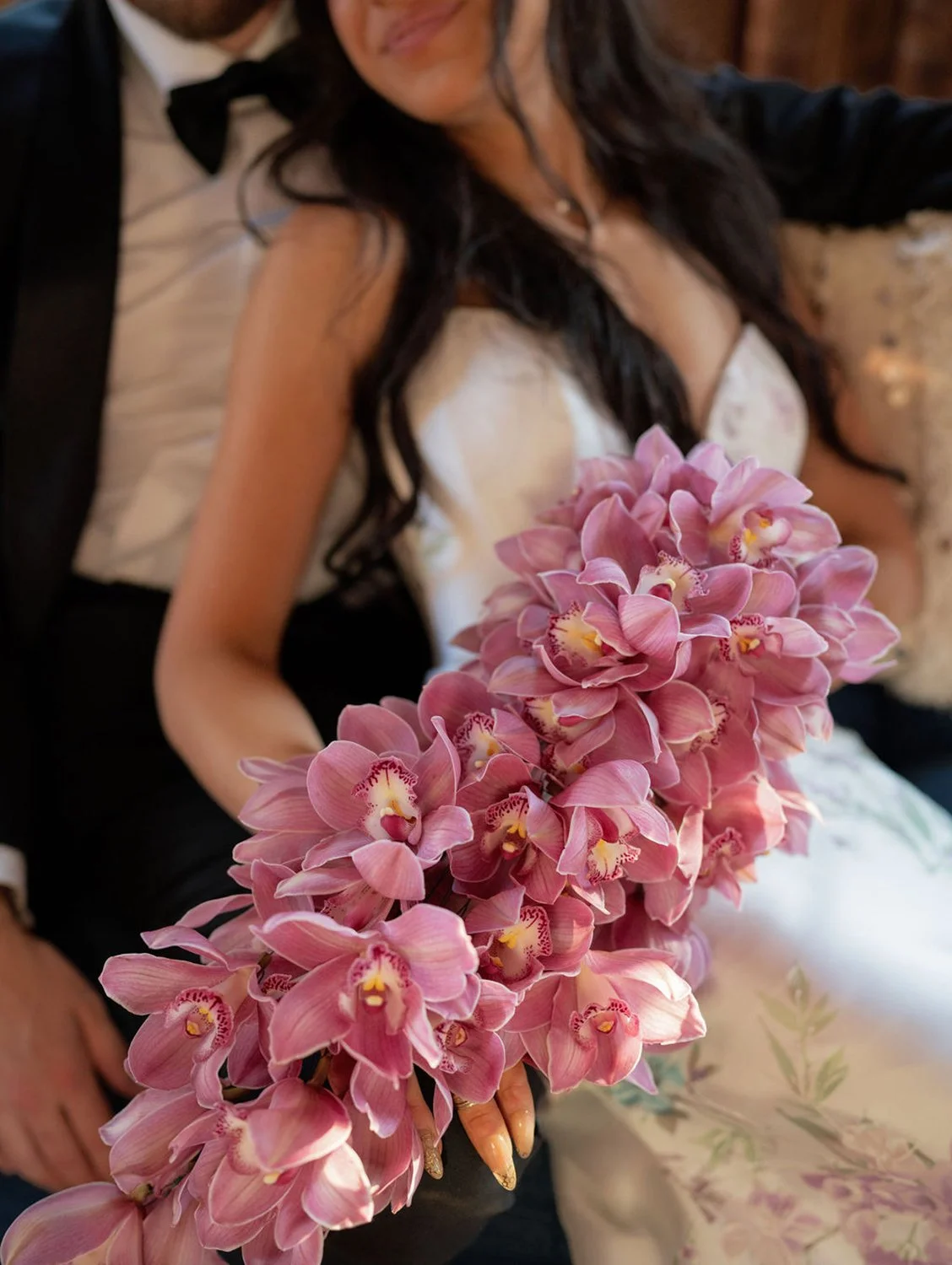 bride-groom-bridal-bouquet-cymbidiums-unique-wired-cascade-artful