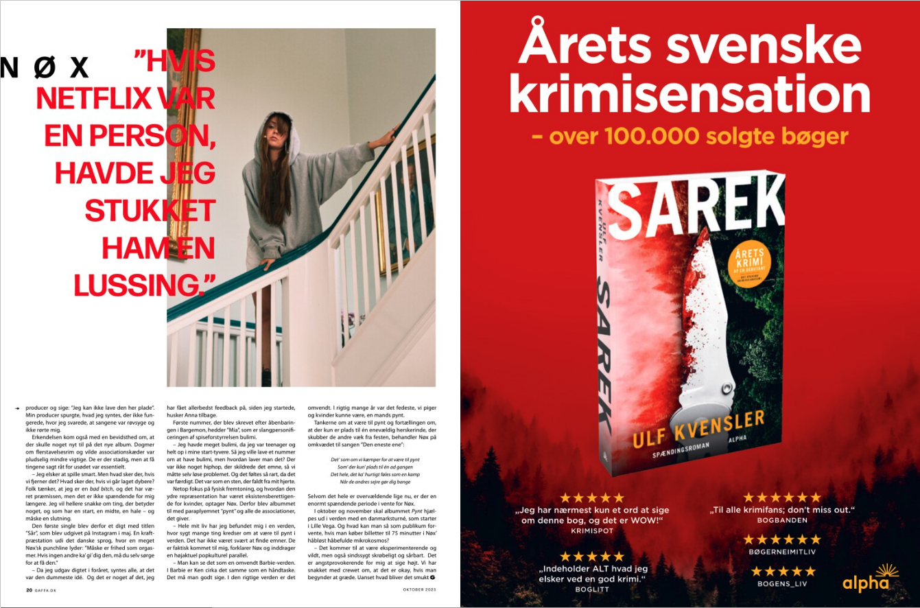 A woman with long hair, wearing a gray hoodie, standing on a staircase with a white railing, looking towards the camera. Nøx, Gaffa, Ej Blot til Pynt.