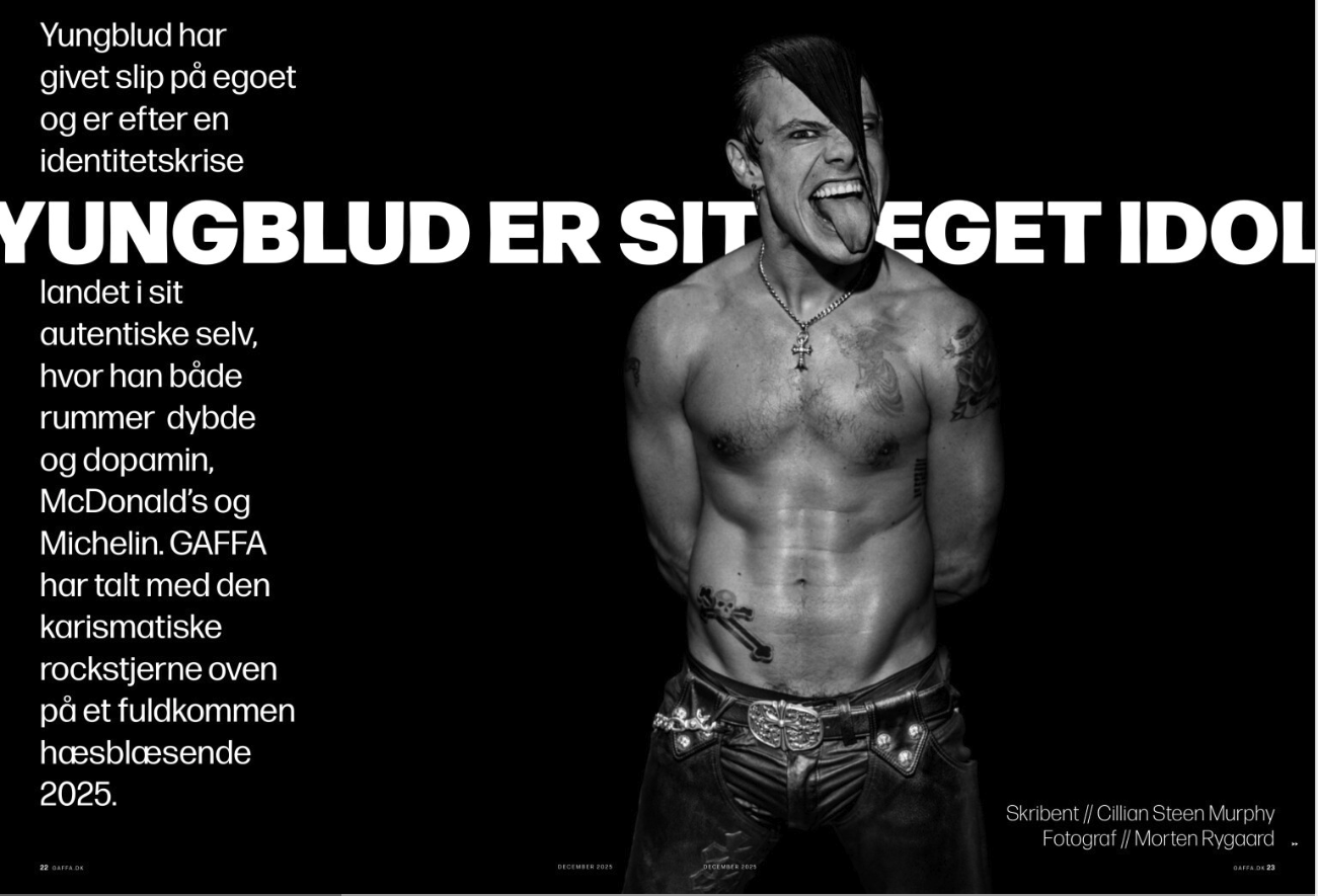 Black and white photograph of Yungblud with tattoos, making a face and sticking out his tongue. The background features bold, large text in Norwegian and additional smaller text. Gaffa, Yungblud er sit eget idol