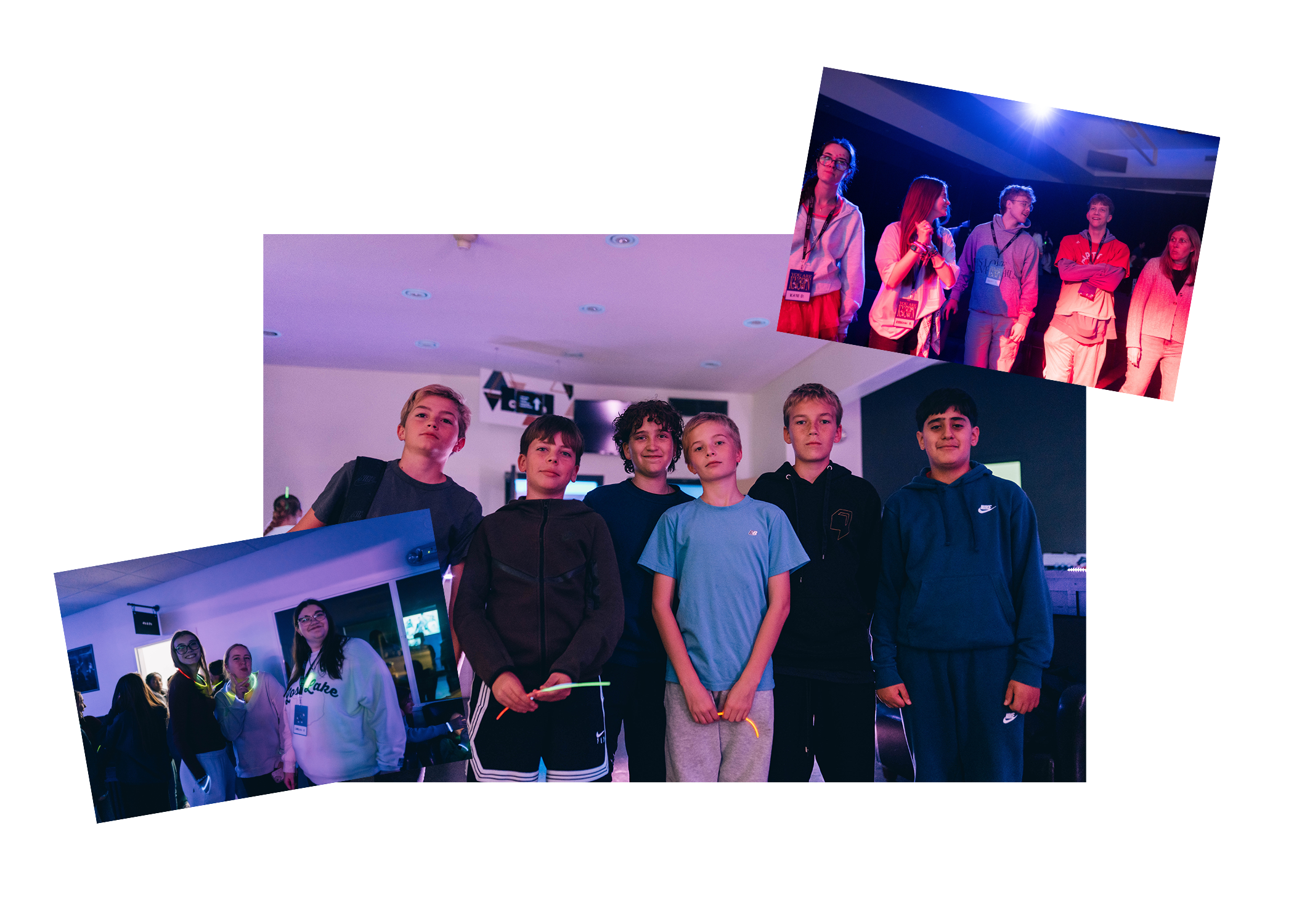 Group of boys in a dark room with colorful lighting, standing together and posing for the photo.