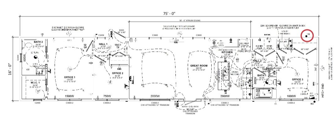 Architectural blueprint floor plan of a residential house showing rooms, walls, doors, and fixtures, with measurements and annotations.
