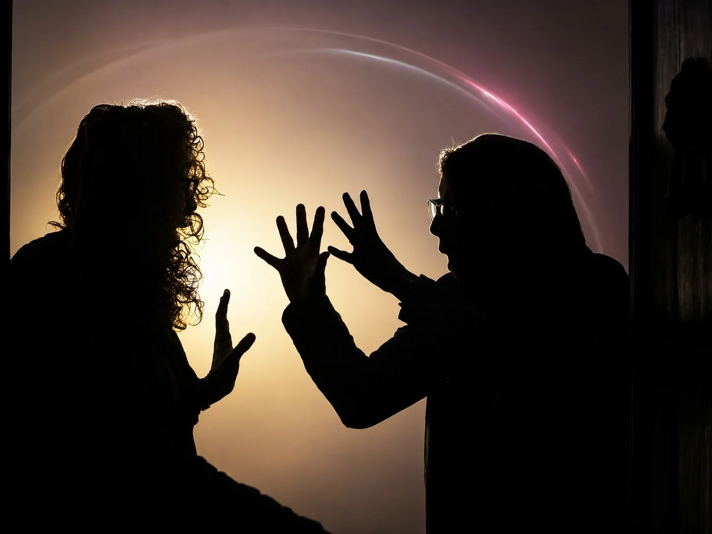 Photo of two women in an argument representing the challenge of managing executive team conflict.