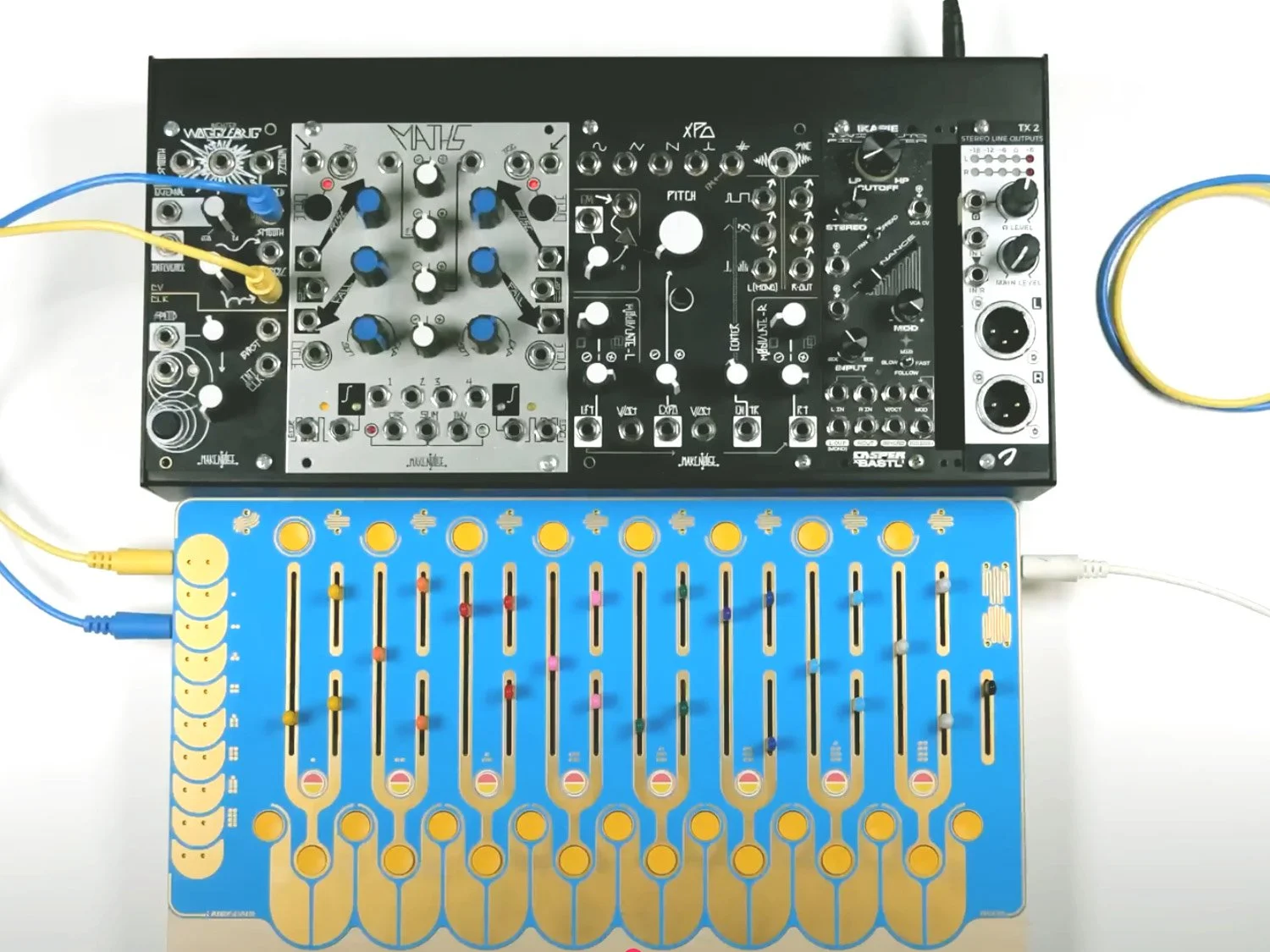 Noon b-stock blue connected to eurorack modular system.