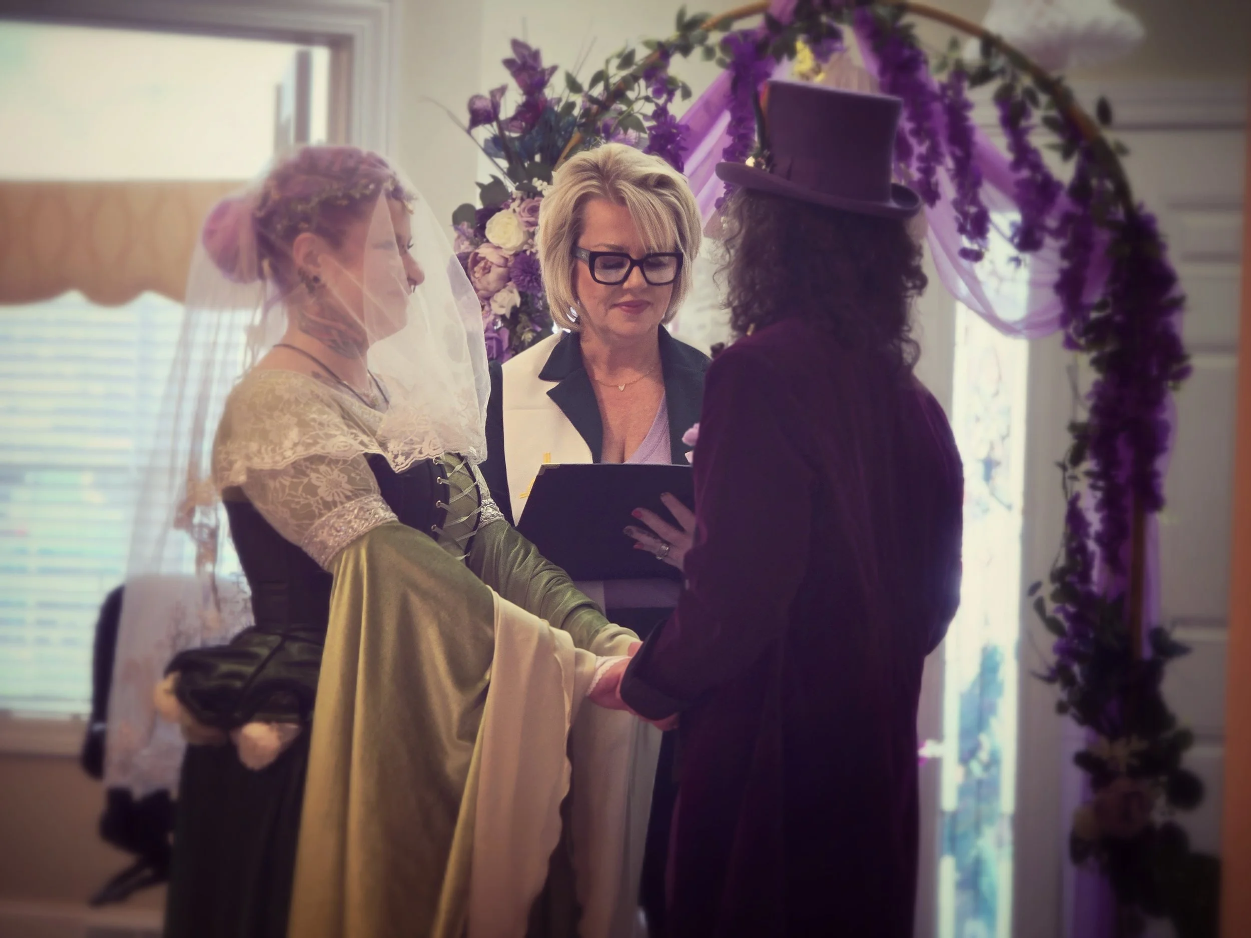 Wedding Officiant and Couple.jpg