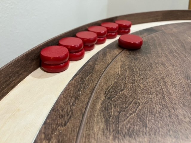 Close up shot of the rail, tray, and discs.