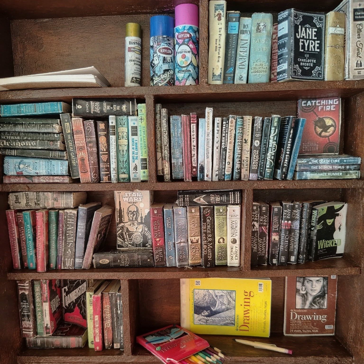 Turn old books into something brand new!

Join us for our Miniature Book Making Class and learn how to create charming little books using pages from old paperback novels. This easy, creative class is perfect for anyone who enjoys hands-on projects, r
