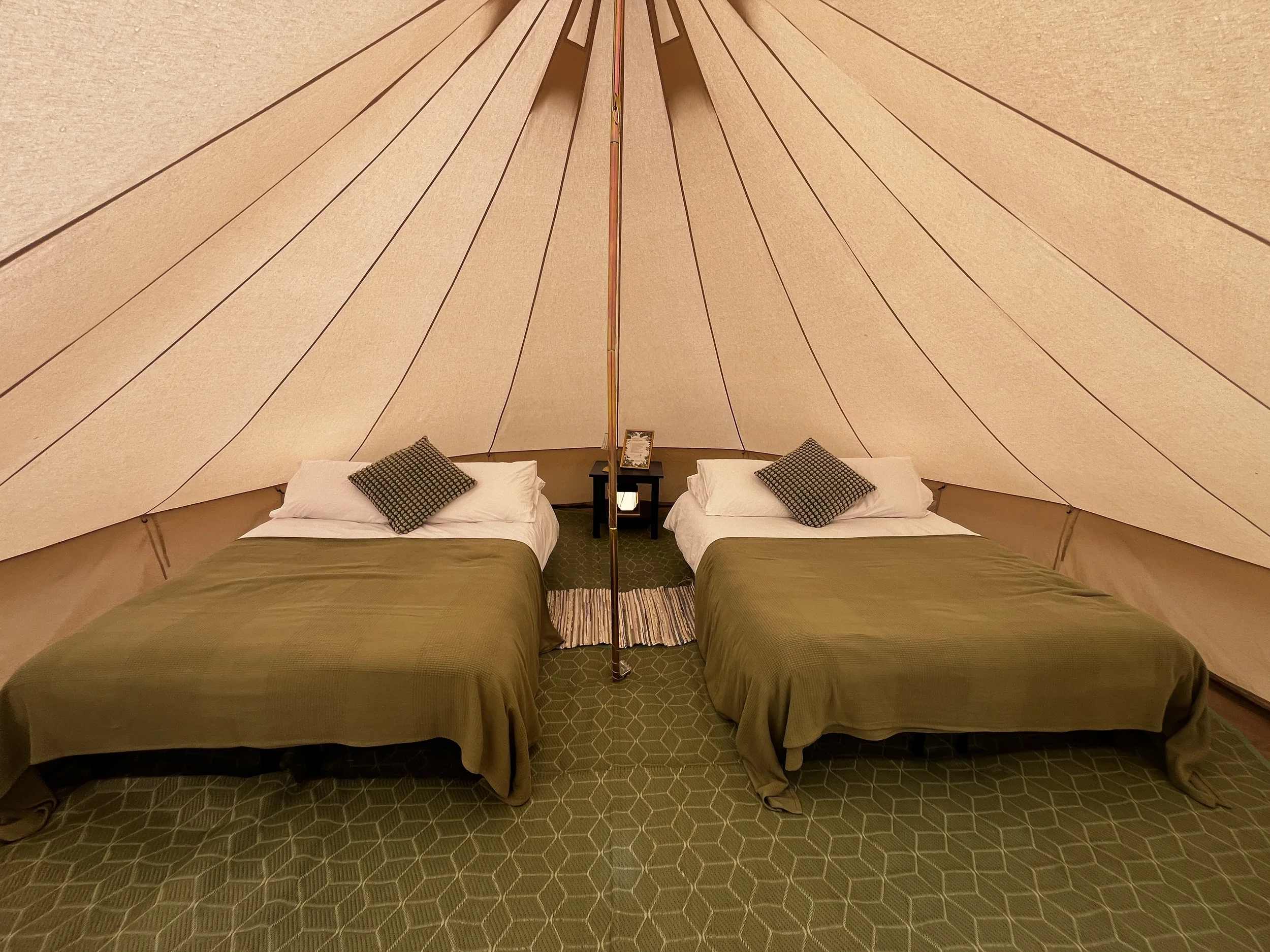 enwild glamping 5m bell tent 2 double beds.webp