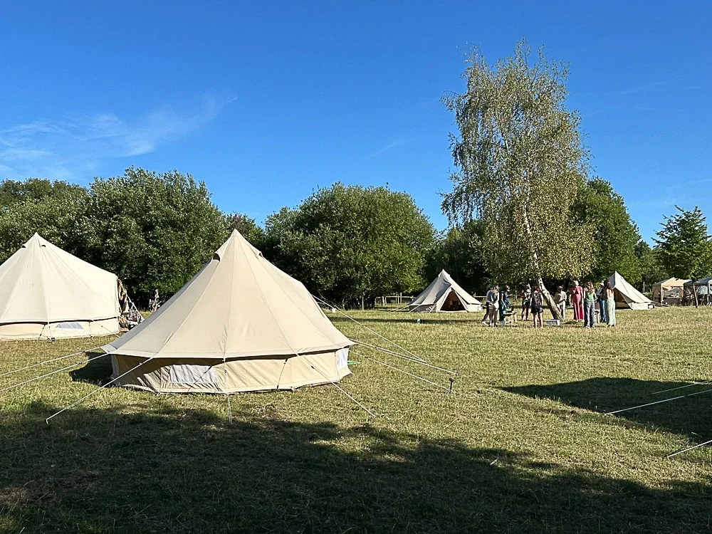 enwild retreat in oxfordshire | a 3-day luxury nature and wellness experience with yoga, meditation, sound baths & forest bathing | retreat field.webp