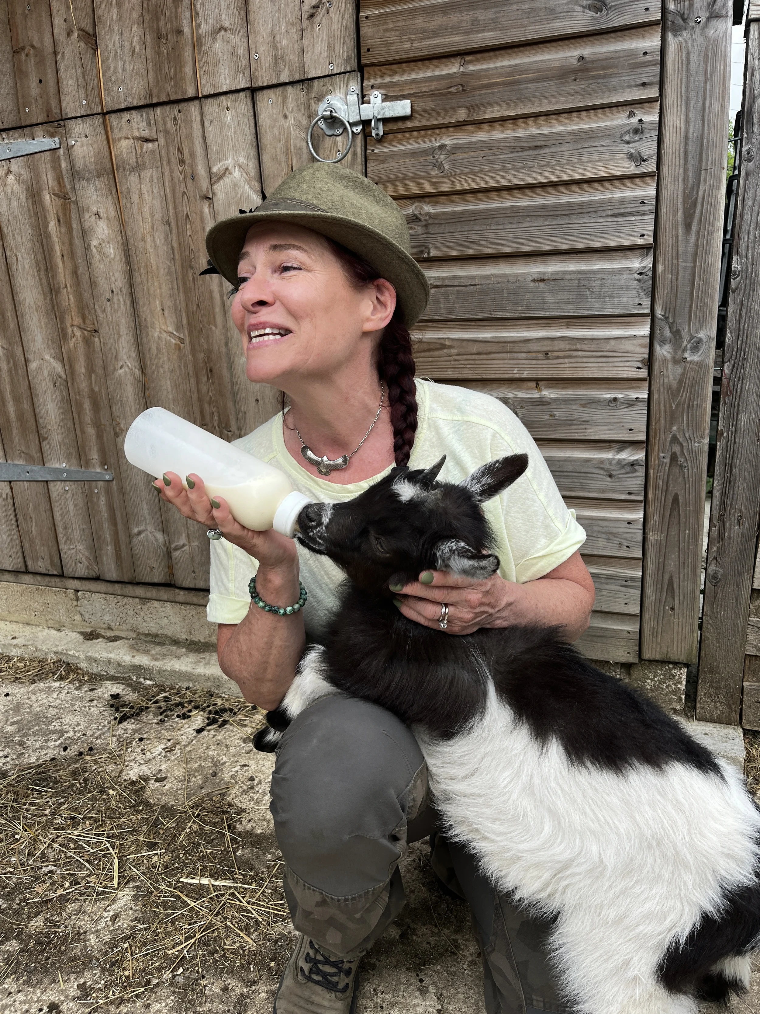 enwild retreat cuddle the goats.webp