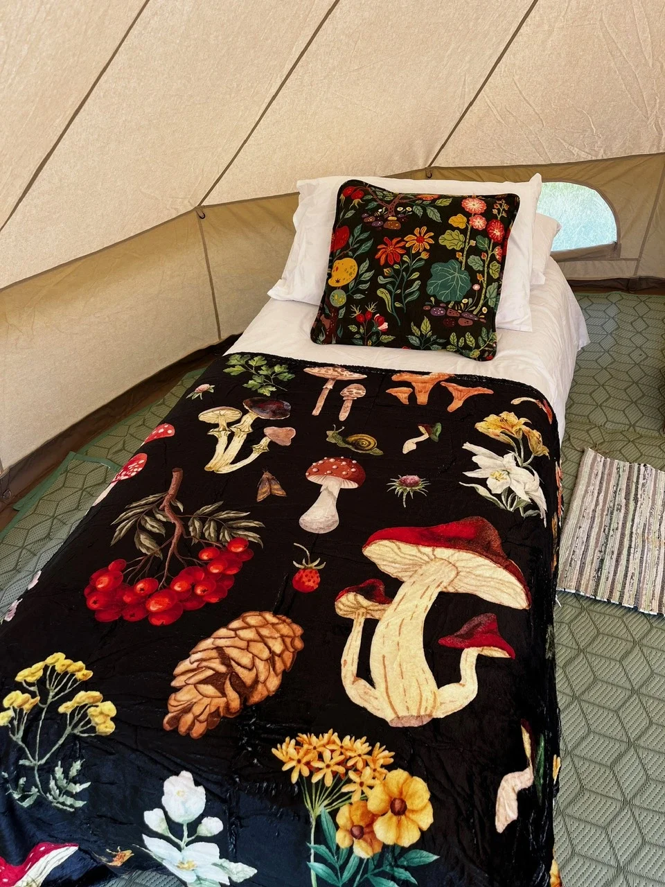 enwild glamping 4m bell tent single bed.webp