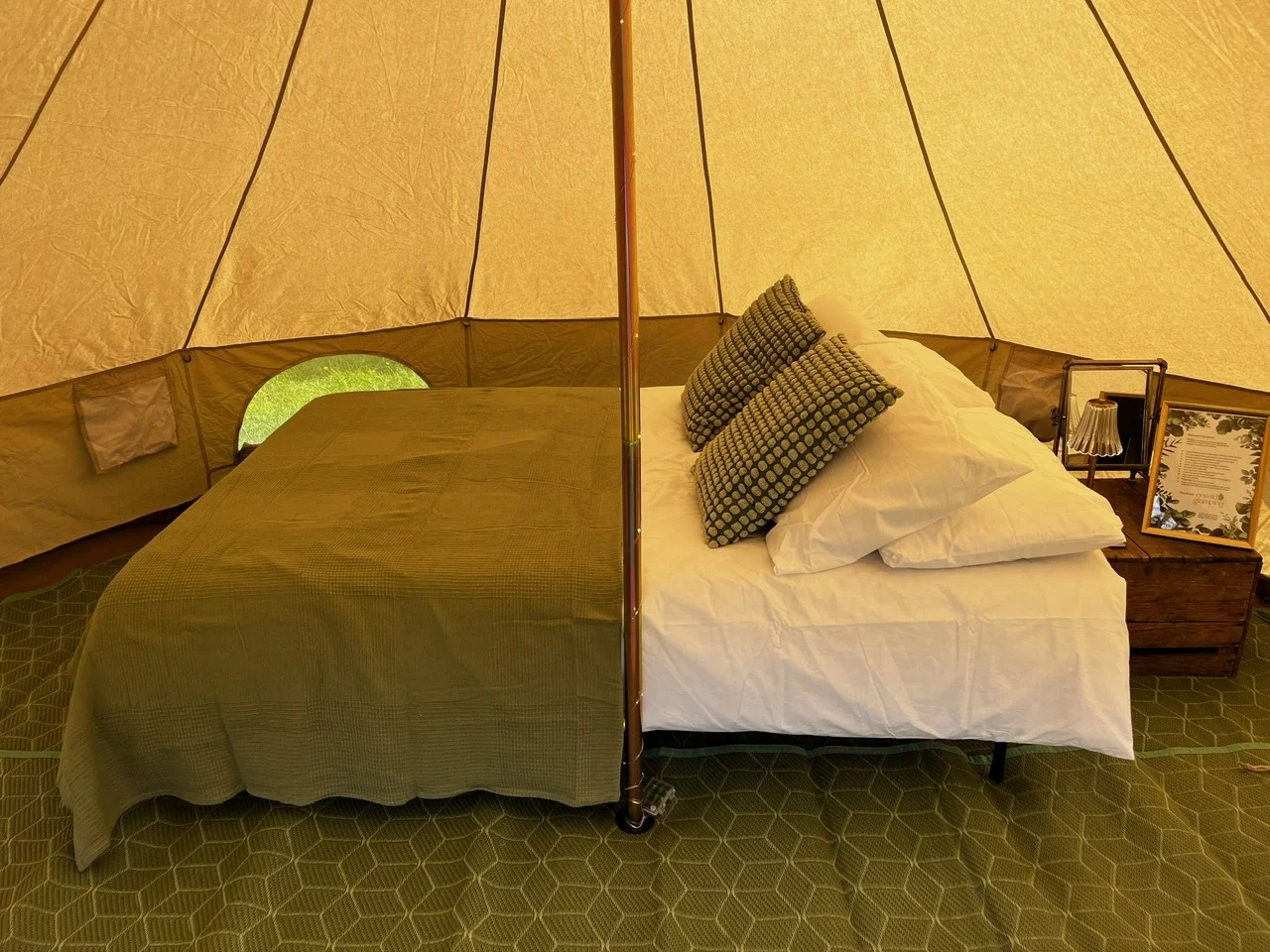 enwild glamping 4m bell tent double bed green cover.webp