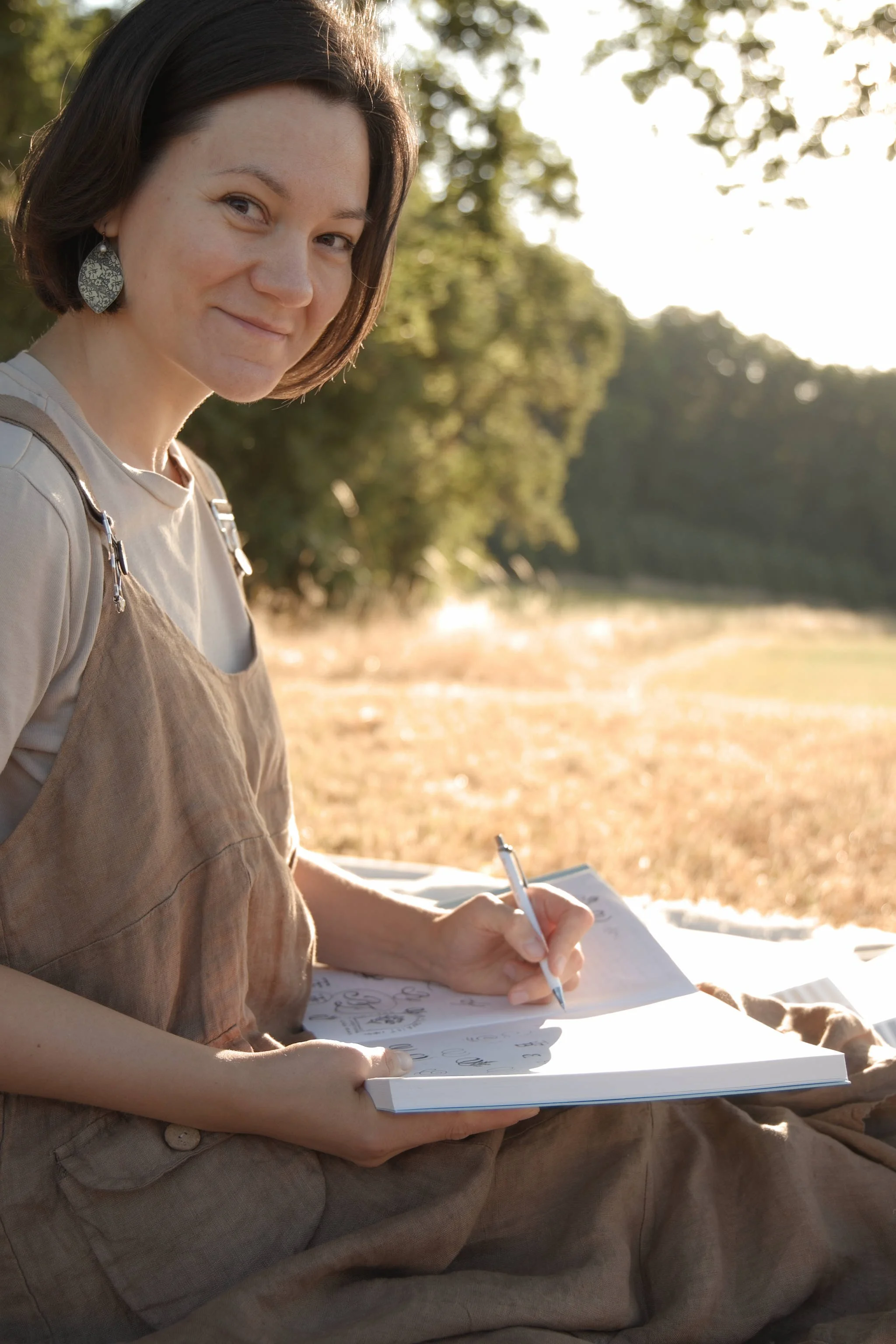 Maria Hoefflin sketching in nature, The Brand Flourist, intentional branding for conscious creators