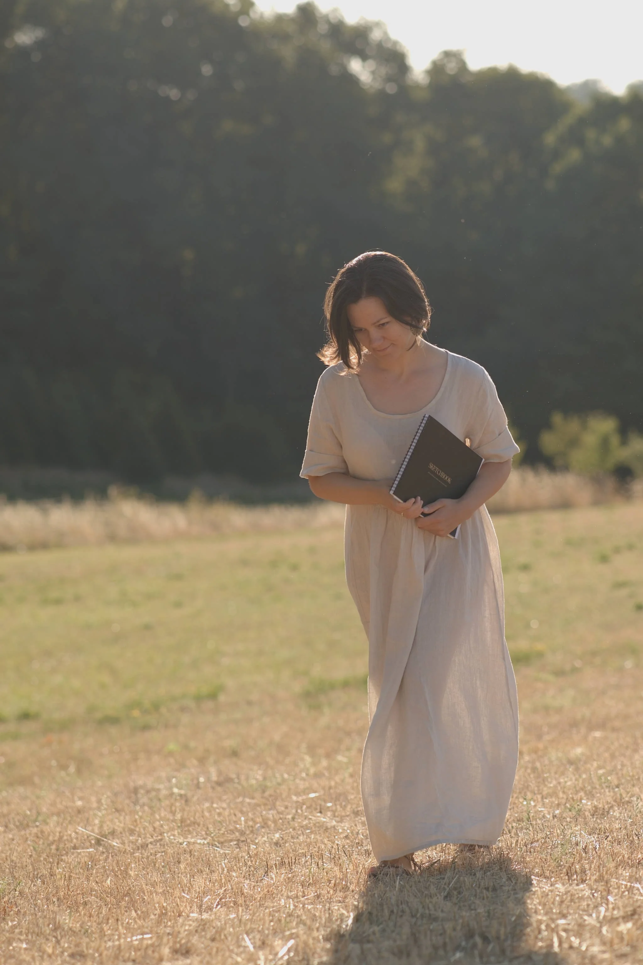 Maria Hoefflin walking in nature, The Brand Flourist, intentional branding for conscious creators
