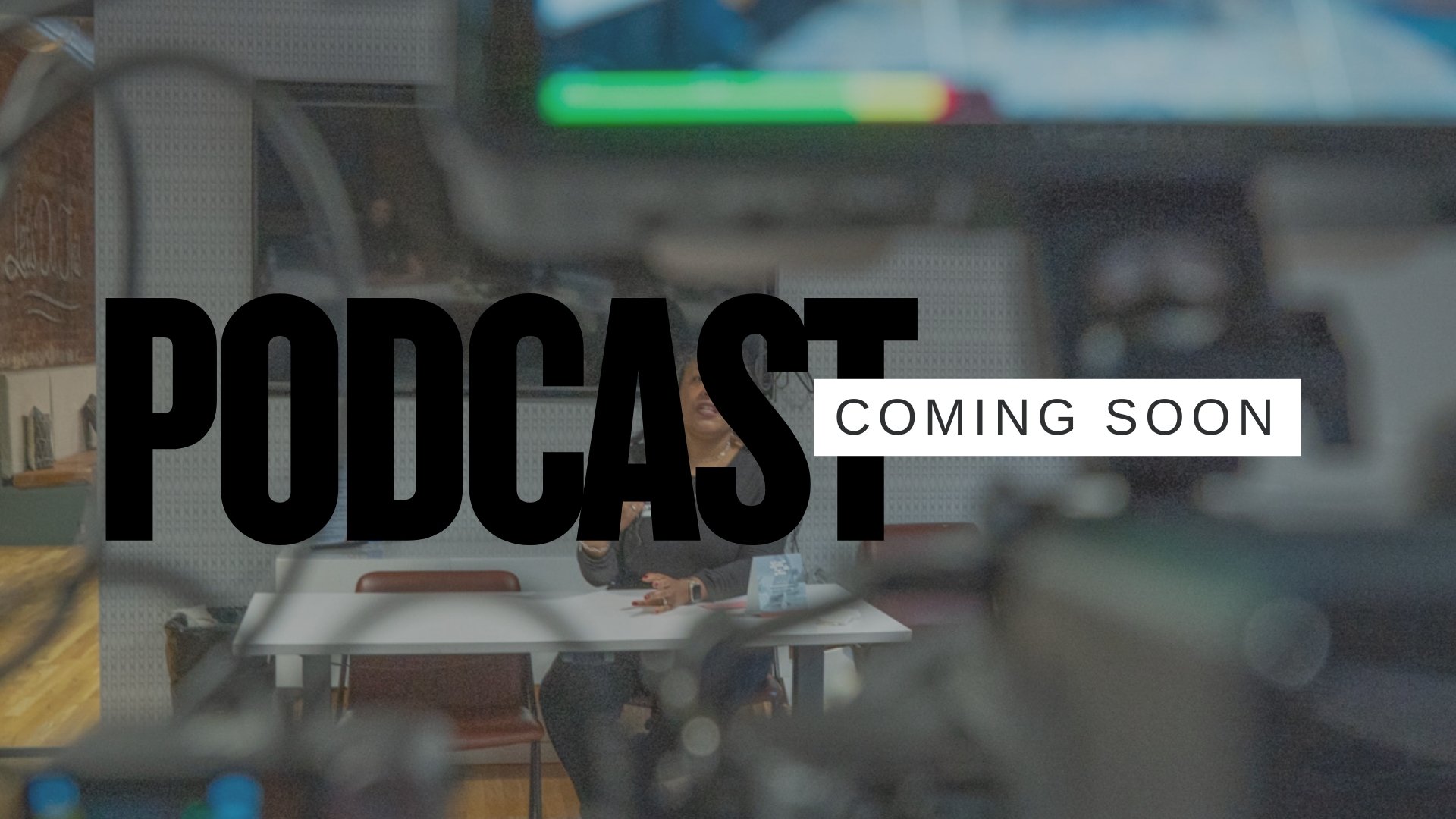 A person sitting at a table in a cafe, with the words 'PODCAST COMING SOON' overlayed.