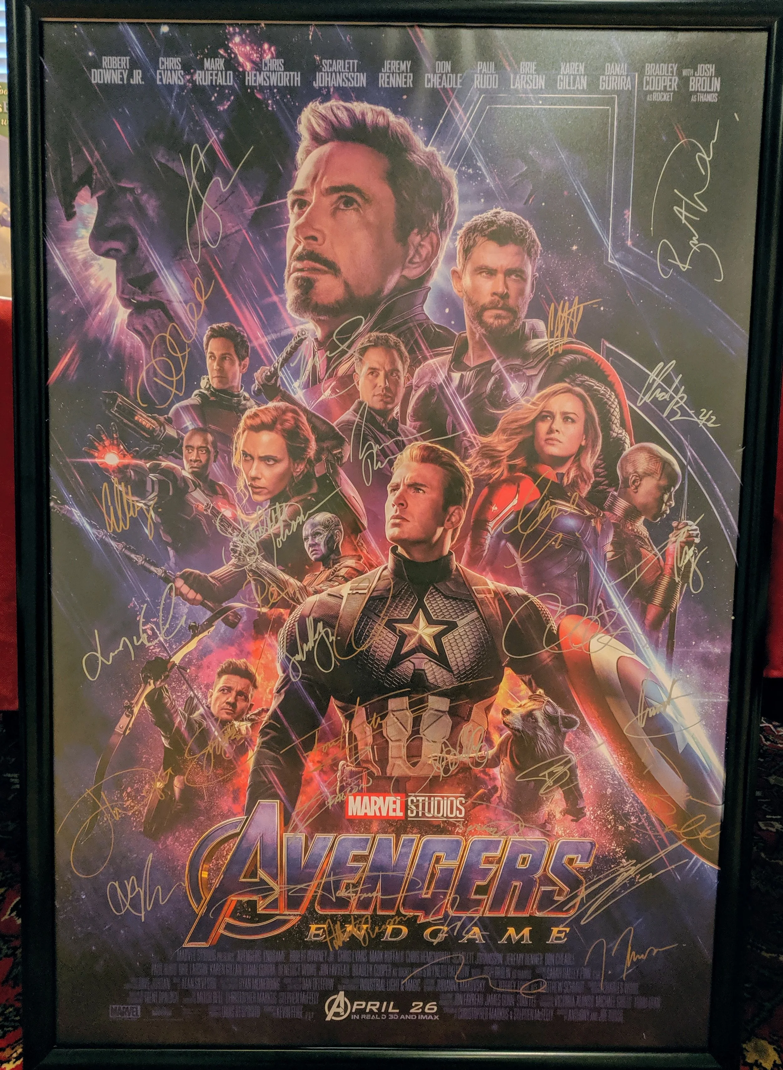 Poster for Marvel's Avengers: Endgame featuring main characters from the movie, including Iron Man, Captain America, Thor, Black Widow, and Hulk, with signatures from cast members.