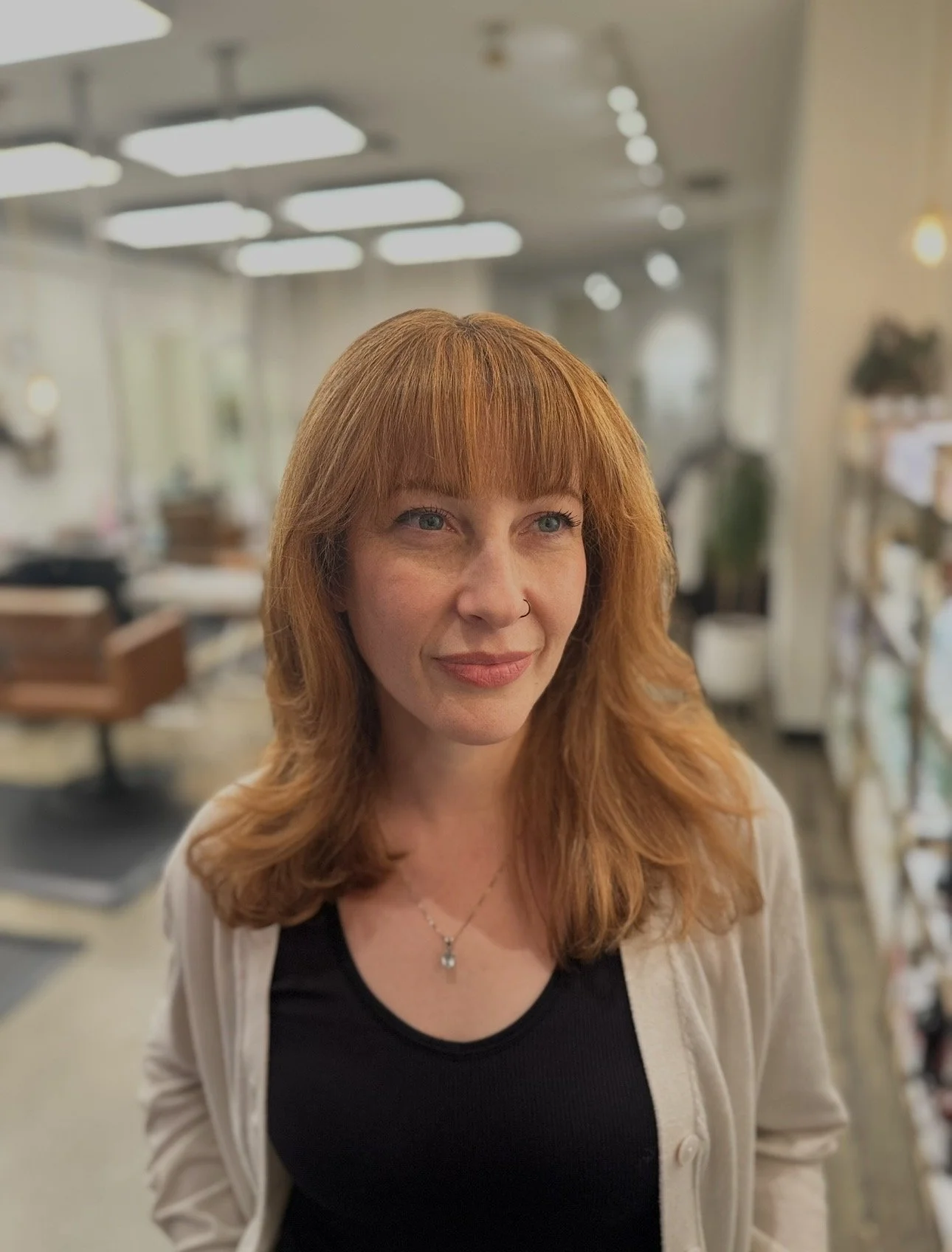 Woman with Copper Hair, Cameron Lugo Color Specailist at Coven Sacramento in Midtown Sacramento