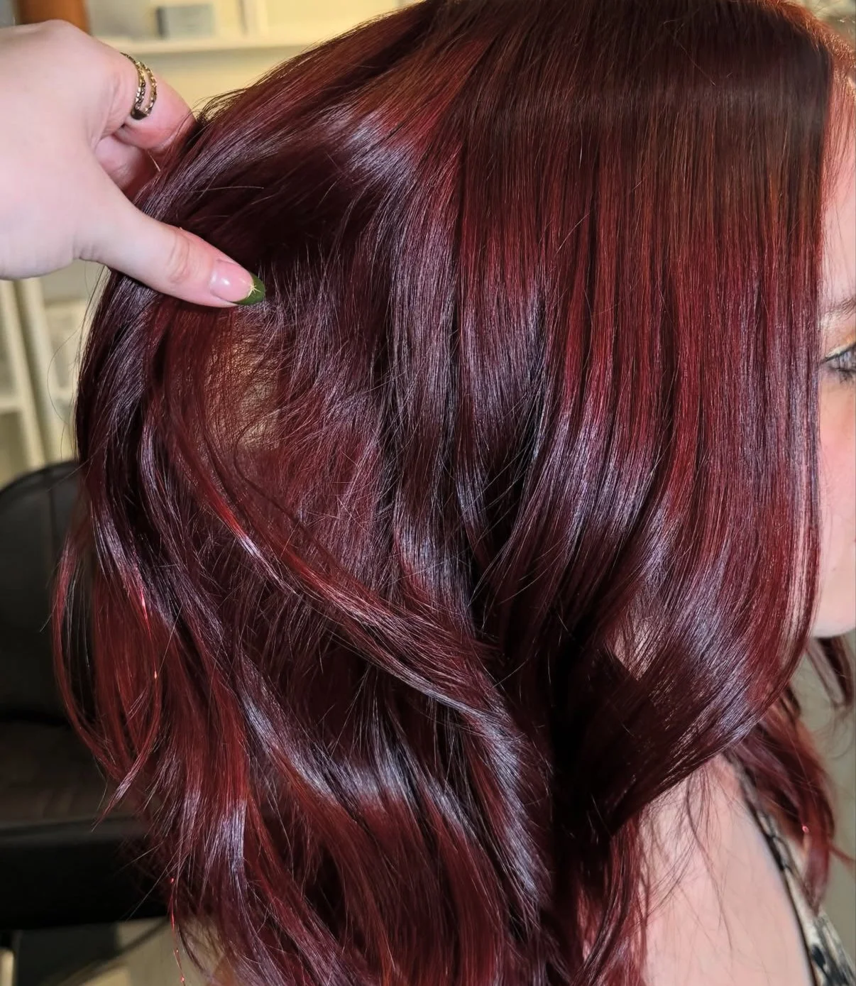 Shiney Red Color by Emma Storey at Coven Beauty Collective in Midtown Sacramento