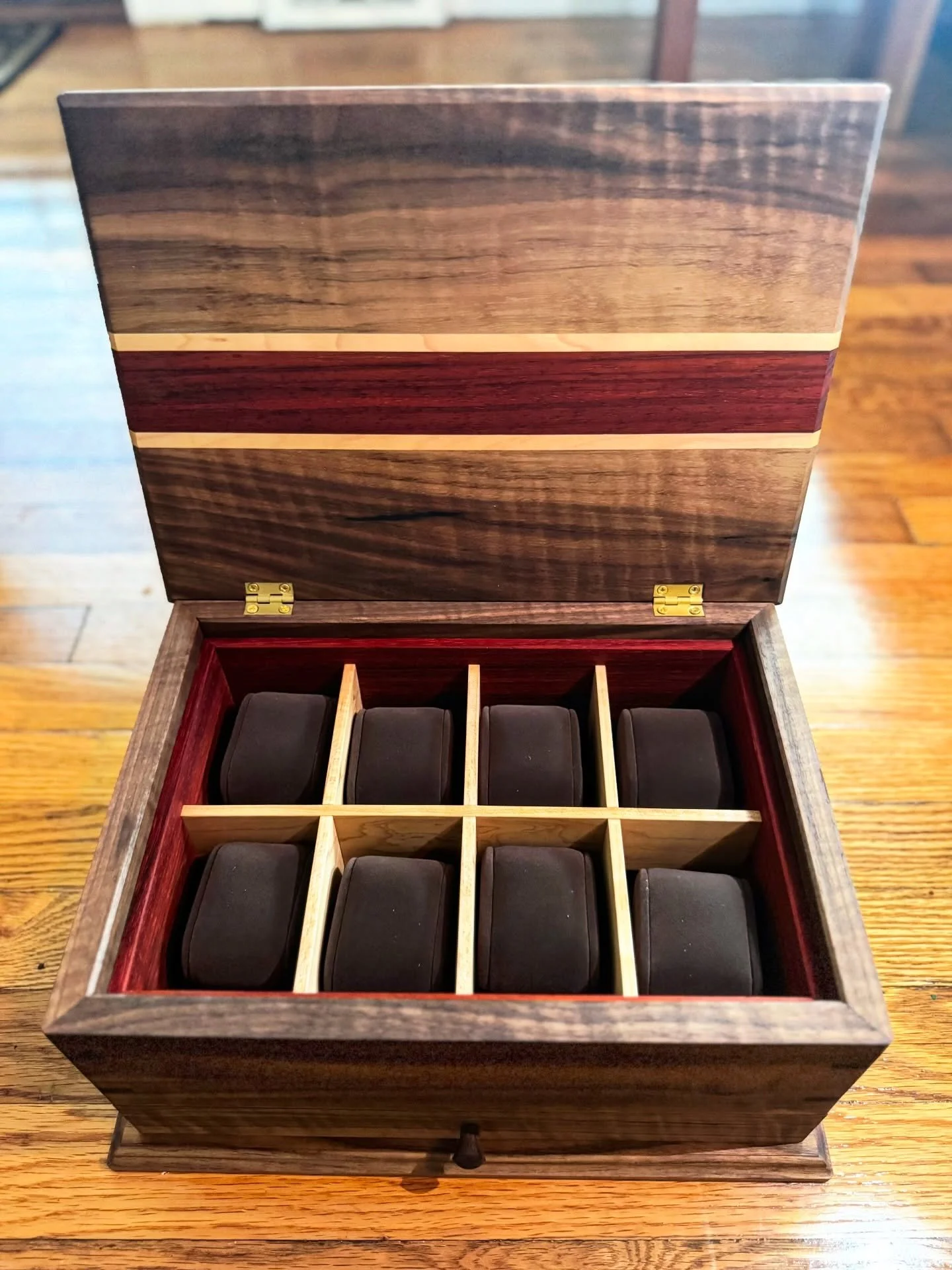 Time flew by in 2025, so I made a way to harness it in 2026! ⌚️🕰️ Custom made watch box crafted from walnut, maple, and padauk wood. 📩 DM me to get your own custom project going in 2026! 🎉 Thank you all for supporting my small business and helping