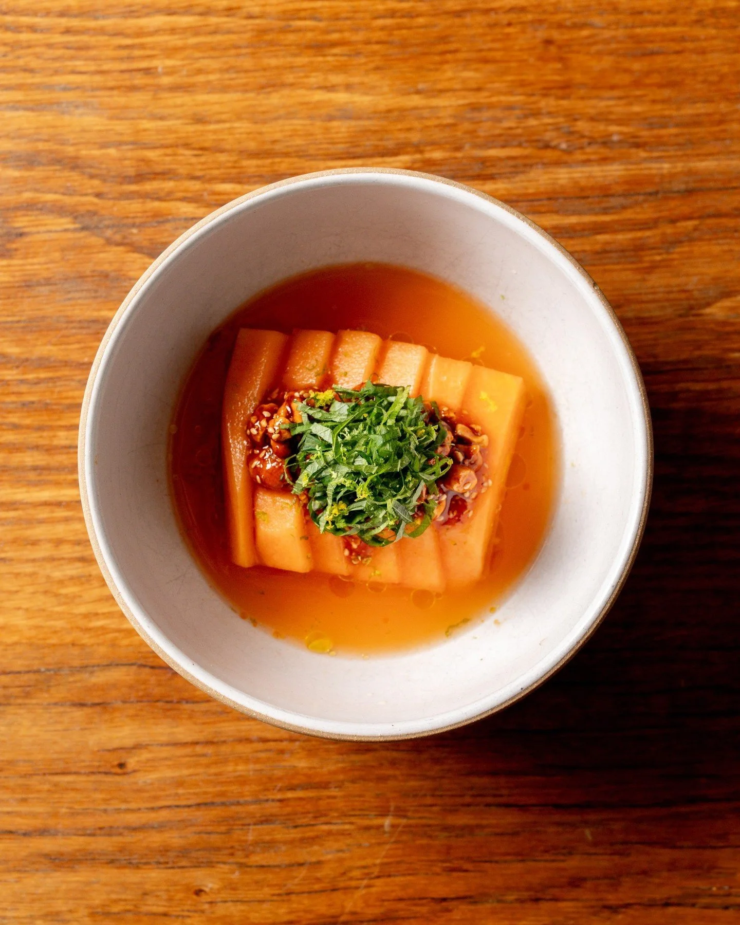 Sweet, refreshing, and ready for the spotlight&mdash;our Honey Kiss Melon just entered the chat.

HONEY KISS MELON // melon dashi, cashew ra-yu, shiso.