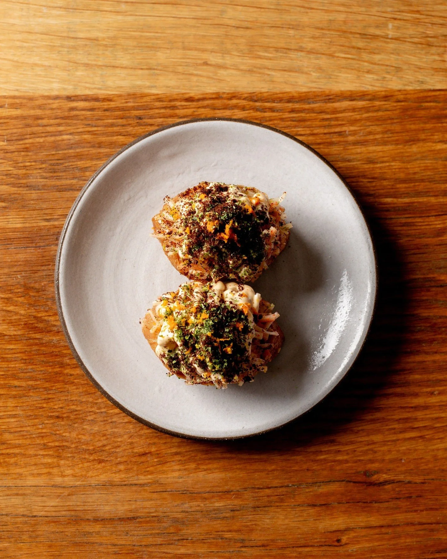 They've been breaking hearts since day one
- and yes, still undefeated.

Pro tip: stop by between 4-5 PM, Tuesday-Friday and grab a $5 pocket. Trust us, one won't be enough.

TOFU POCKETS// kani, rice, yuzu tartar, pumpernickel.