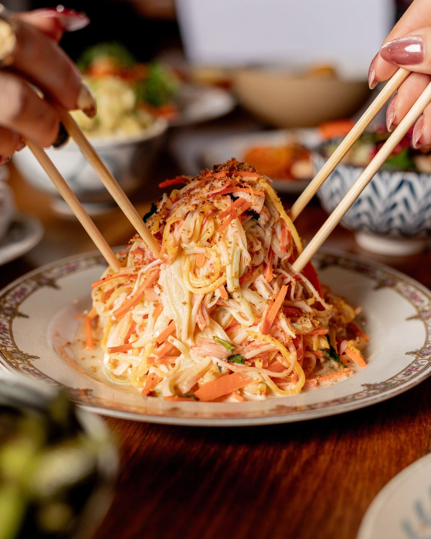 That moment before it disappears.
Cold, creamy kani salad &mdash; stacked high and meant to be shared (but isn&rsquo;t).

KANI SALAD // mango + carrot + cucumber w/ spicy dressing.