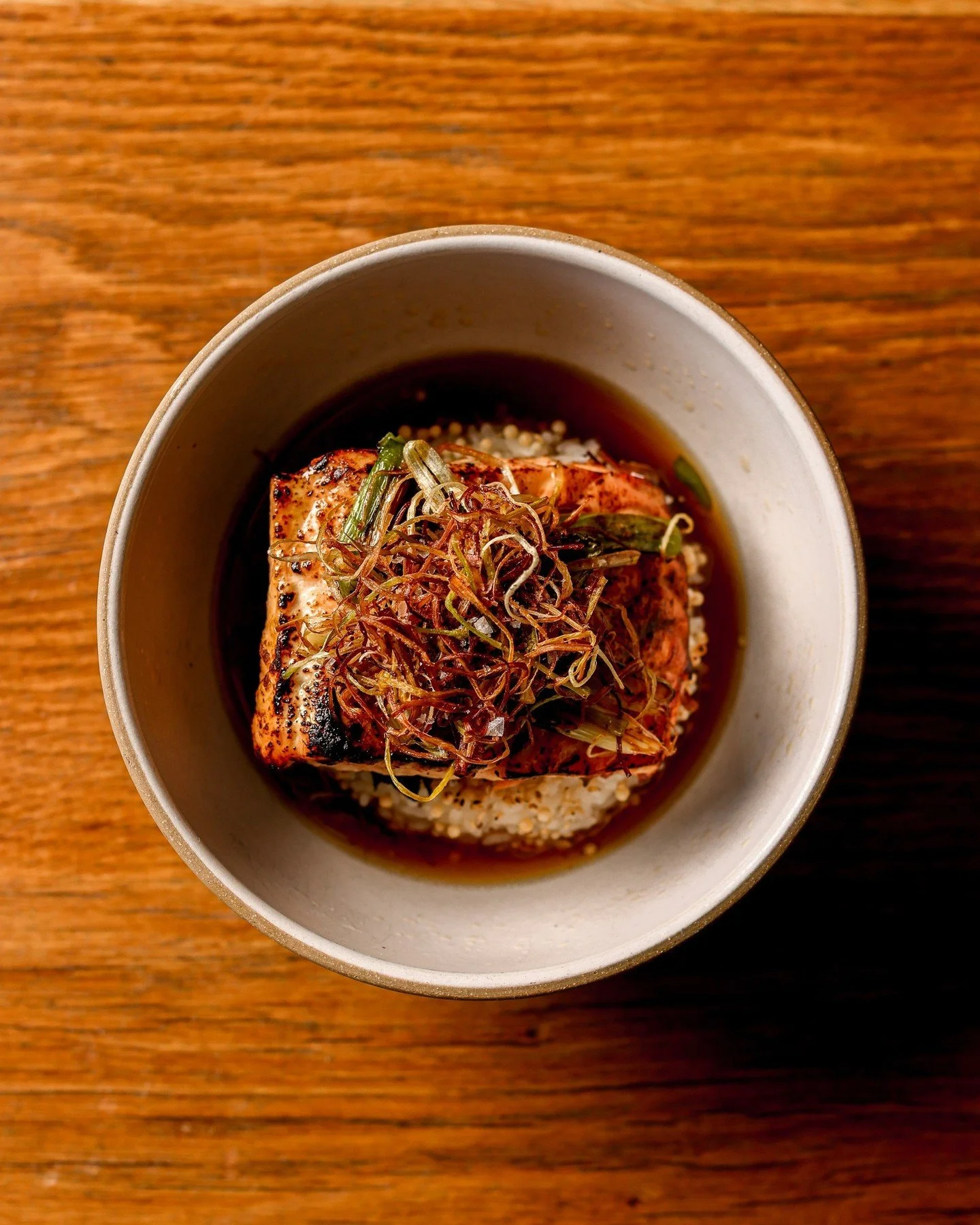 Nothing like the miso salmon ochazuke experience where everything just works. 

💥 MISO SALMON OCHAZUKE // yuzu-genmaicha dashi, green onion + sesame rice.