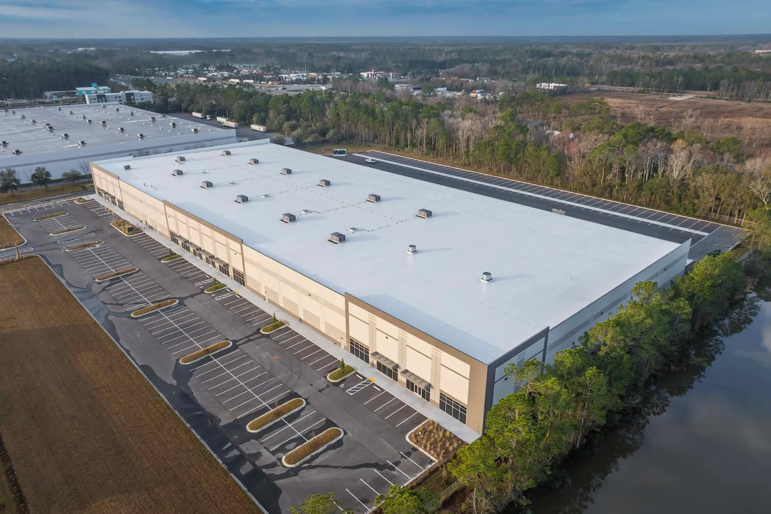 aerial shot of exterior commercial building painting.webp