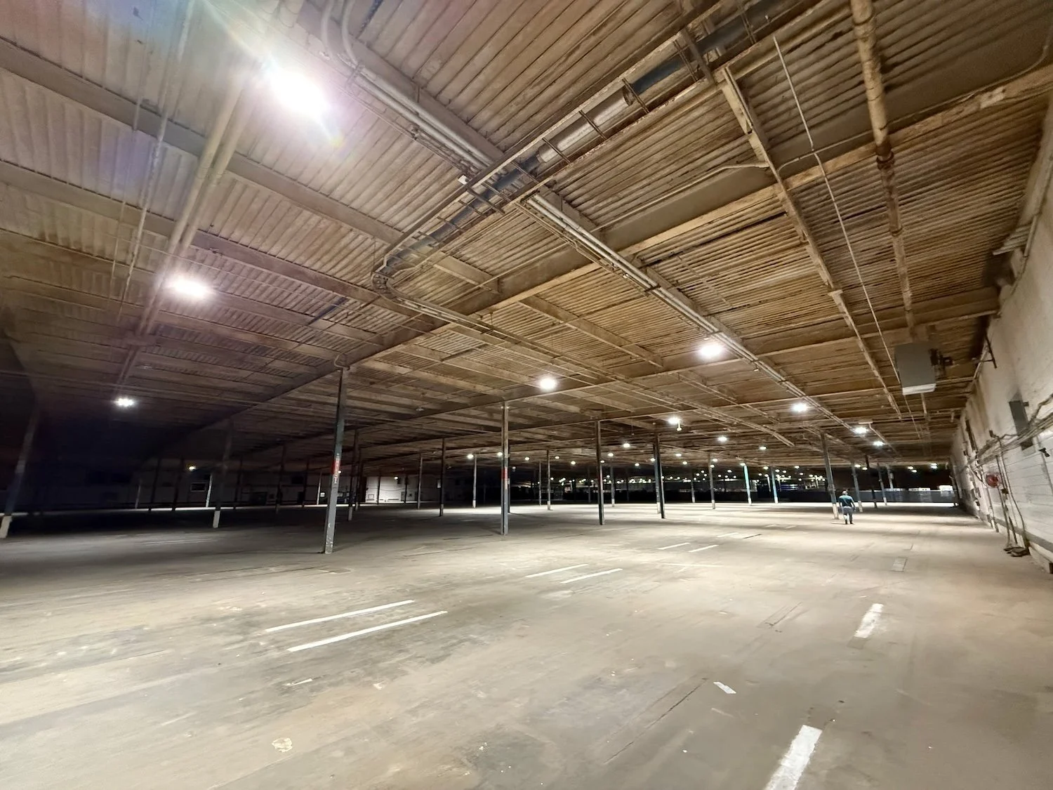 before image of industrial warehouse painting and repair work